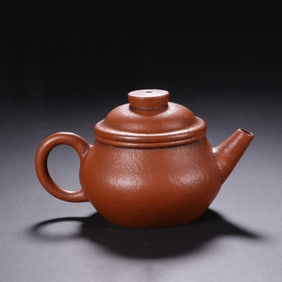 A YIXING GLAZE ZISHA TEAPOT