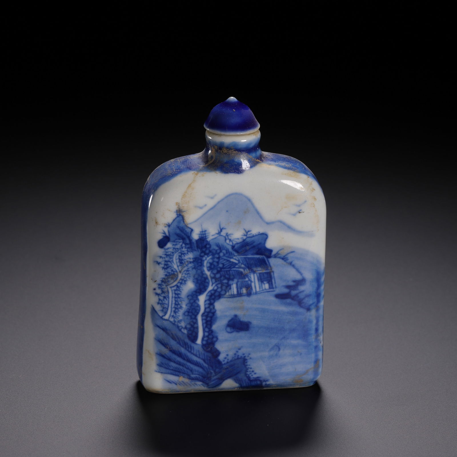 A BLUE AND WHITE LANDSCAPE SNUFF BOTTLE WITH COVER (1 of 9)