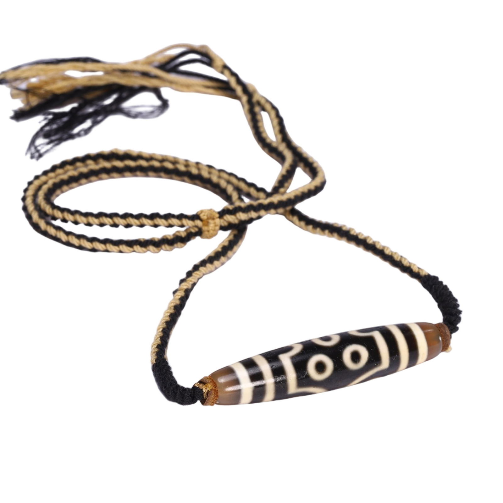 A TIBETAN DZI BEAD PENDANT (1 of 9)