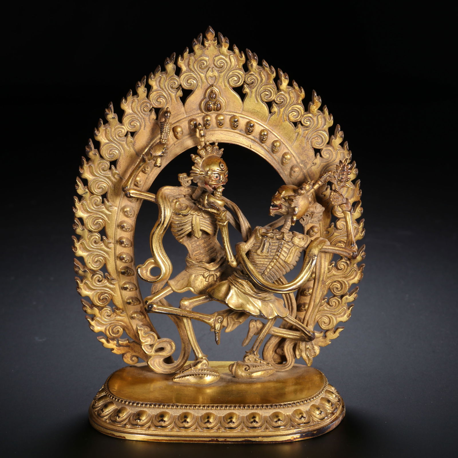 A BRONZE-GILT FIGURE OF CHITIPATI (1 of 9)