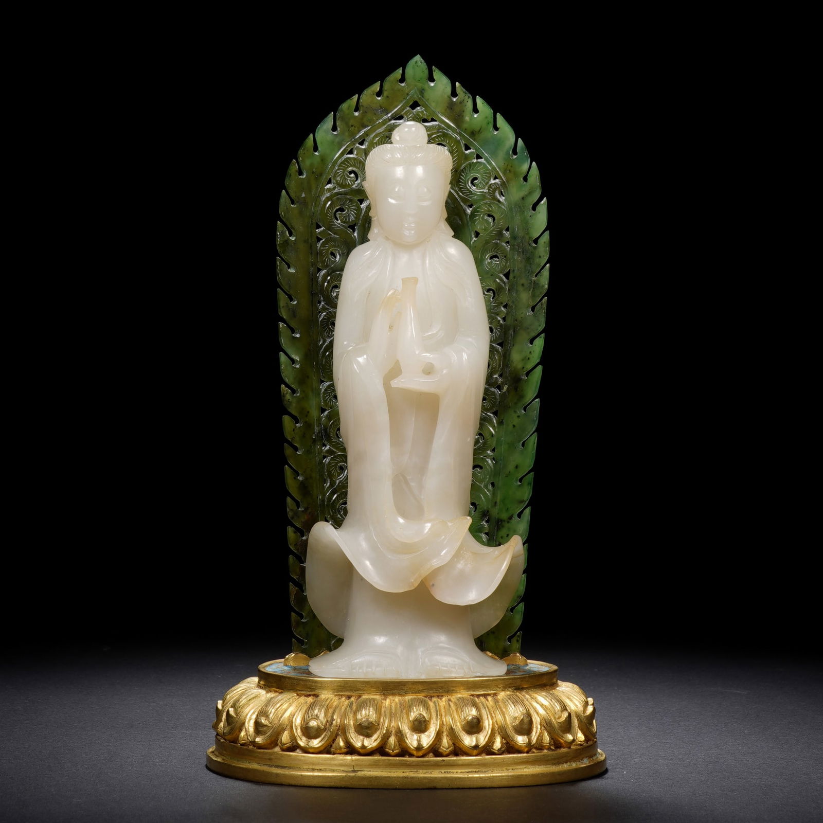 A RARE CARVED WHITE JADE STANDING GUANYIN (1 of 9)