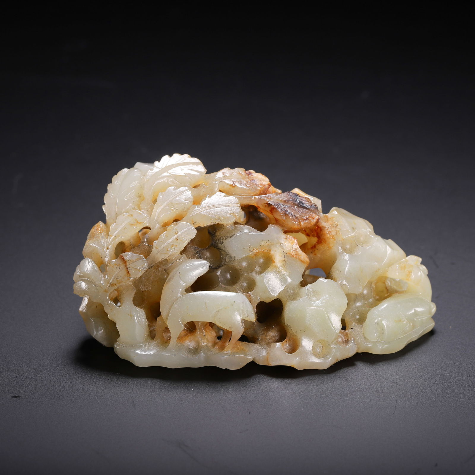 A CARVED JADE DECORATION (1 of 9)