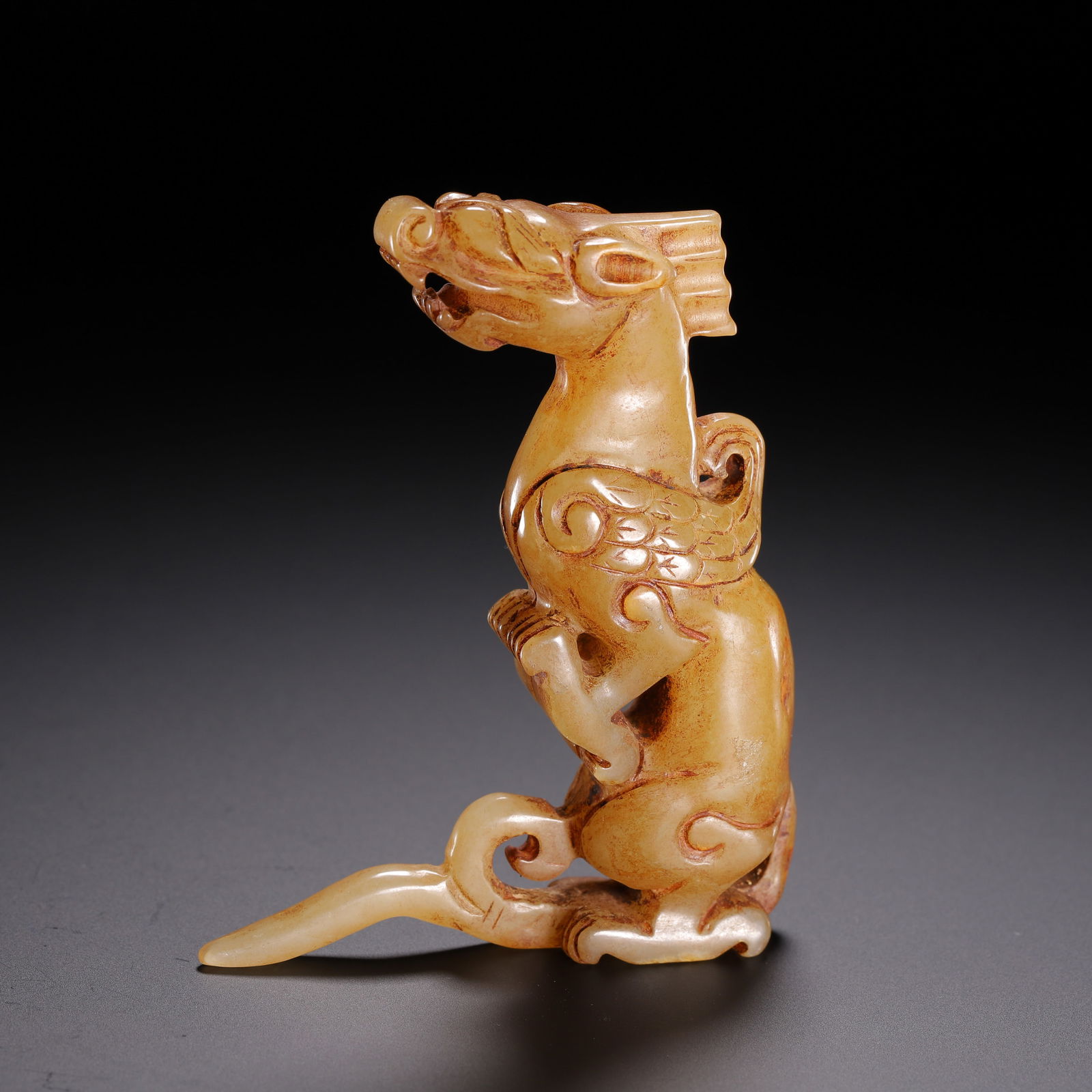 A CARVED JADE DRAGON (1 of 9)