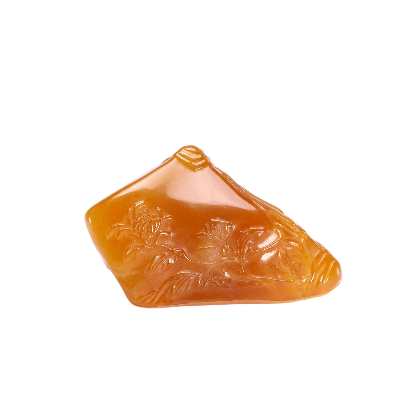 A CARVED TIANHUANG DECORATION: A CARVED TIANHUANG DECORATION This Chinese Tianhuang stone ornament is carved from a piece of rich, honey-yellow Tianhuang stone, renowned for its rarity and smooth, waxy luster. The irregularly shape