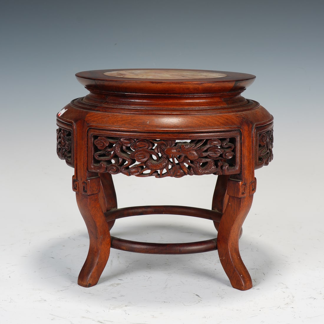 A MARBLE INLAID ANNATTO-WOOD GARDEN STOOL (1 of 8)