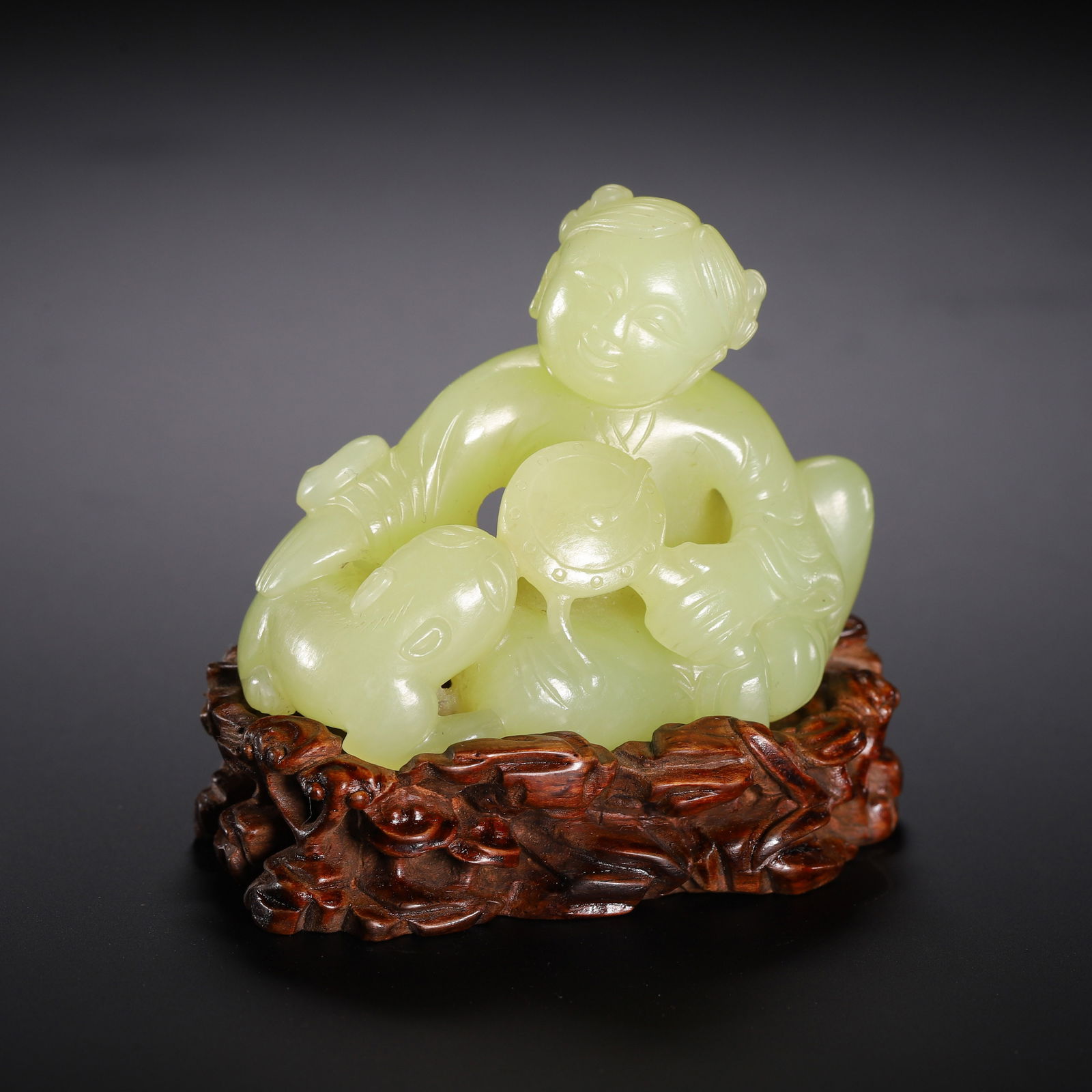 A CARVED YELLOW JADE BOY (1 of 8)