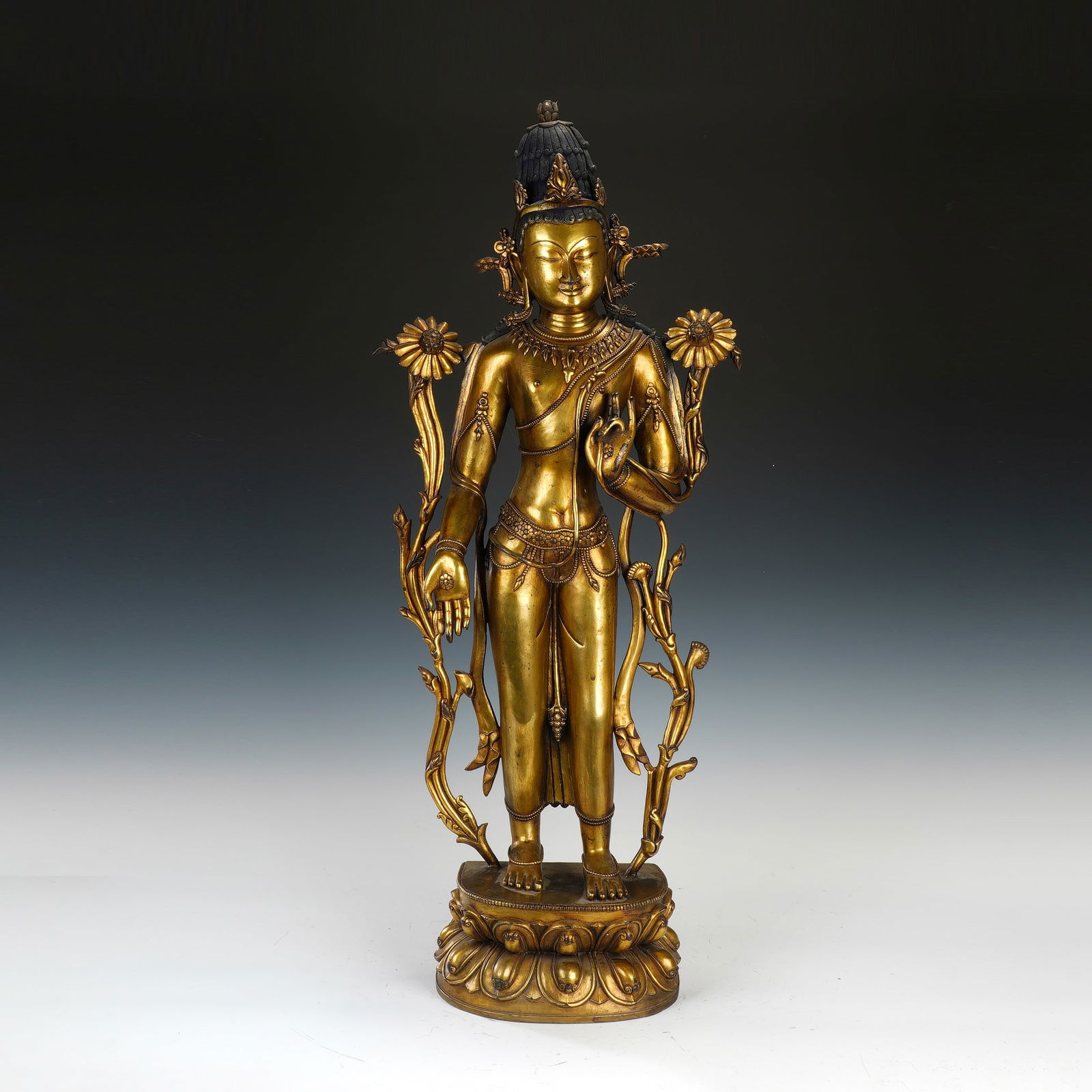 A BRONZE-GILT STANDING PADMAPANI (1 of 12)