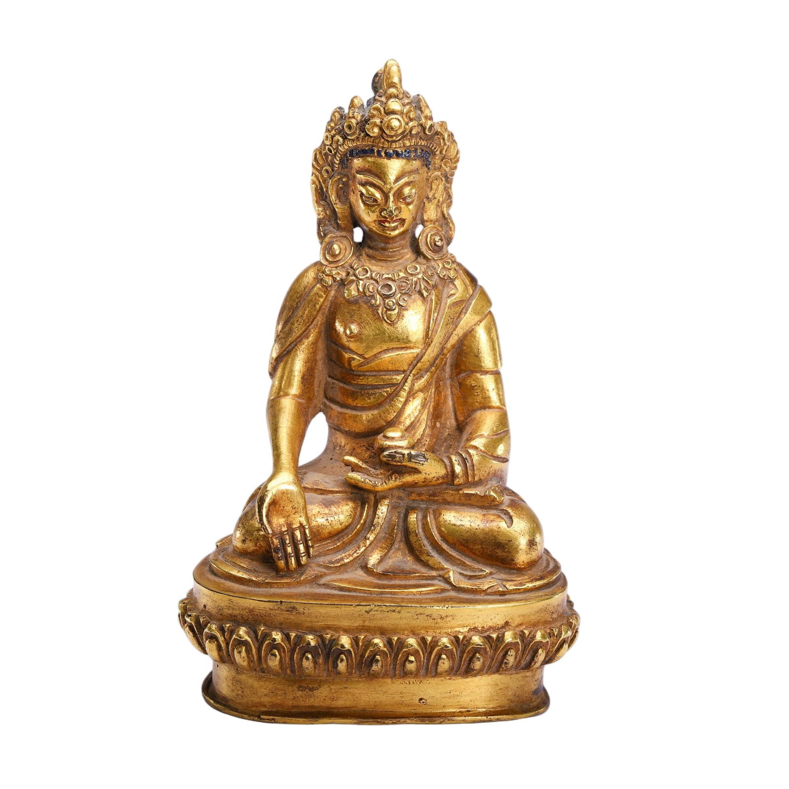 A BRONZE-GILT SEATED BODHISATTVA: A BRONZE-GILT SEATED BODHISATTVA This finely cast gilt bronze Buddha sits in the lotus position, with one hand in varada mudra and the other holding a small alms bowl. The figure wears an ornate