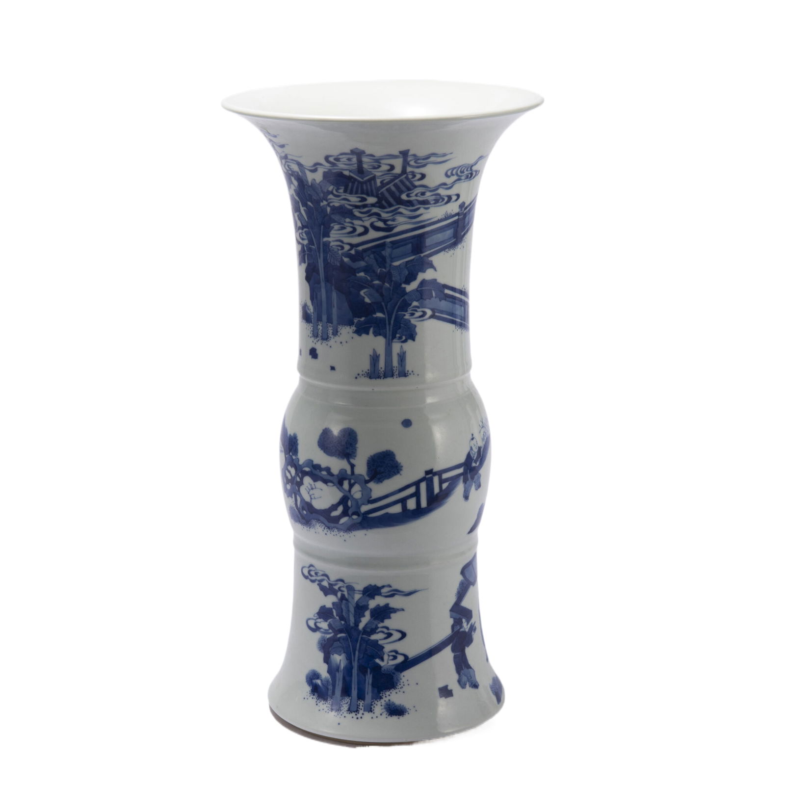 A CHINESE BLUE AND WHITE BEAKER VASE GU: A CHINESE BLUE AND WHITE BEAKER VASE GU This Chinese blue and white 'phoenix tail' zun vase, from the Kangxi period, is a graceful form with a flared mouth, waisted neck, and splayed foot. It is exqui