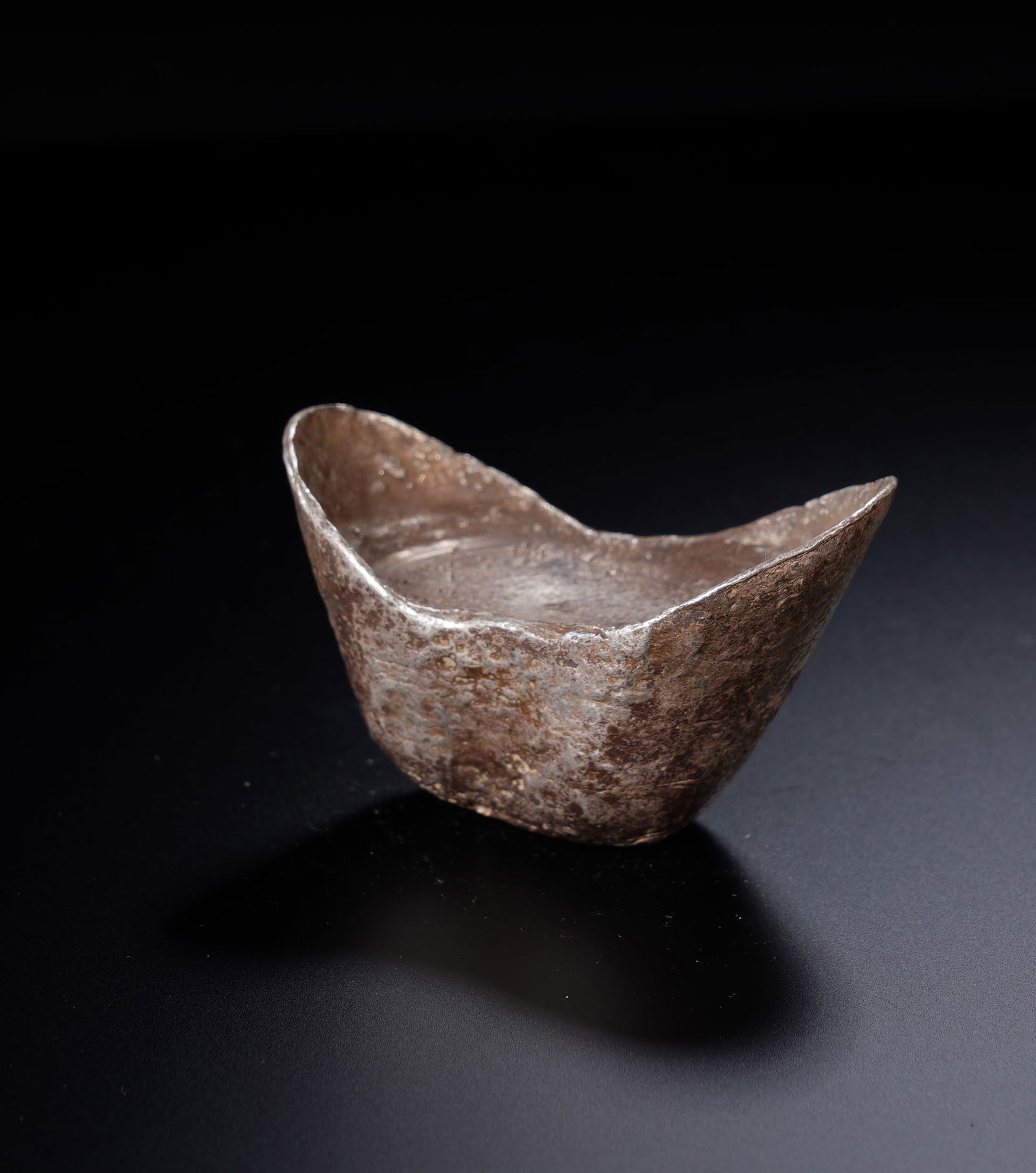 A CHINESE SILVER INGOT (1 of 6)