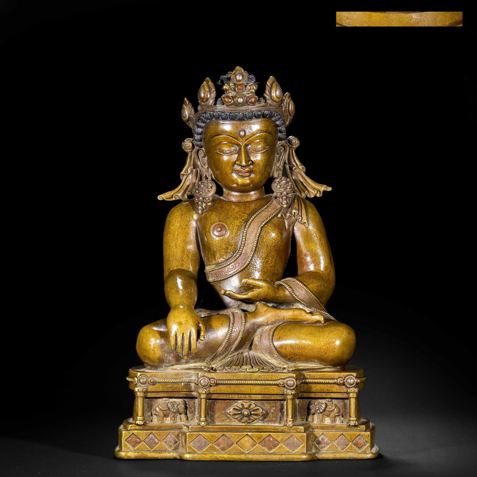 A COPPER ALLOY FIGURE OF CROWN BUDDHA: A COPPER ALLOY FIGURE OF CROWN BUDDHA A Chinese alloy bronze seated Buddha statue, depicted in the bhumisparsha mudra, with a serene expression and an ornate gem-inlaid crown. The figure wears a