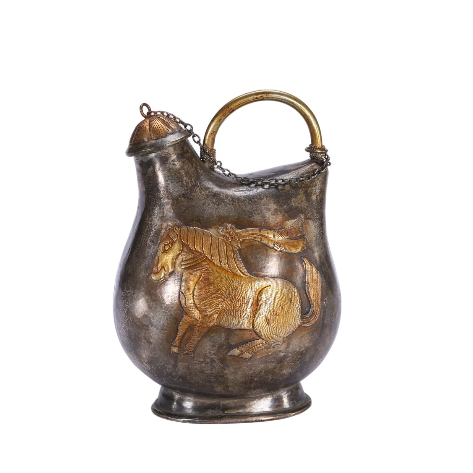 A BRONZE PARTLY GILT EWER: A BRONZE PARTLY GILT EWER This Chinese flask is crafted in the form of a nomadic leather pouch, made from silvered bronze with a prominent gilt-bronze relief of a prancing horse on the front. The hors