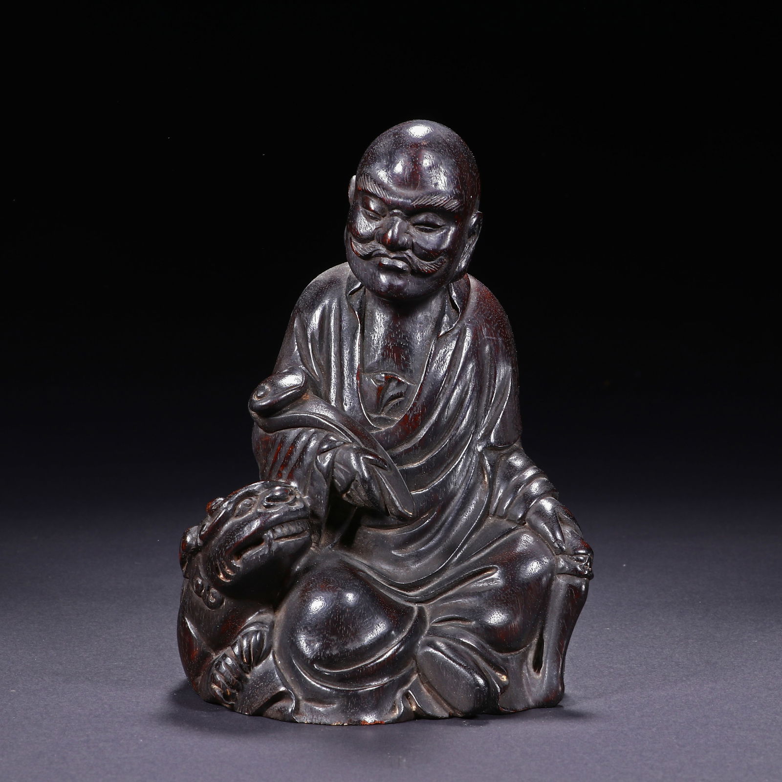 A CARVED ROSEWOOD ZITAN LUOHAN (1 of 8)