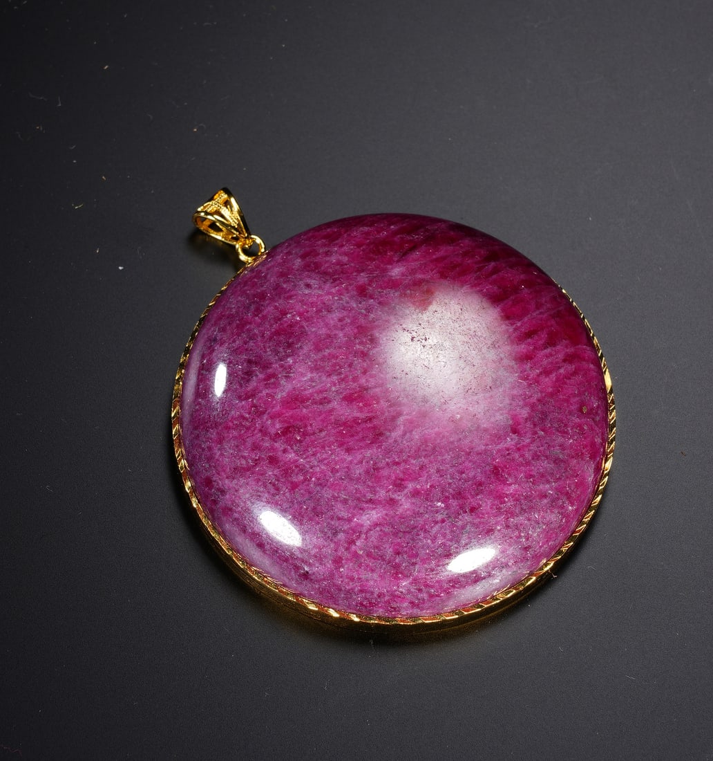 A CARVED RUBY PENDANT - 2