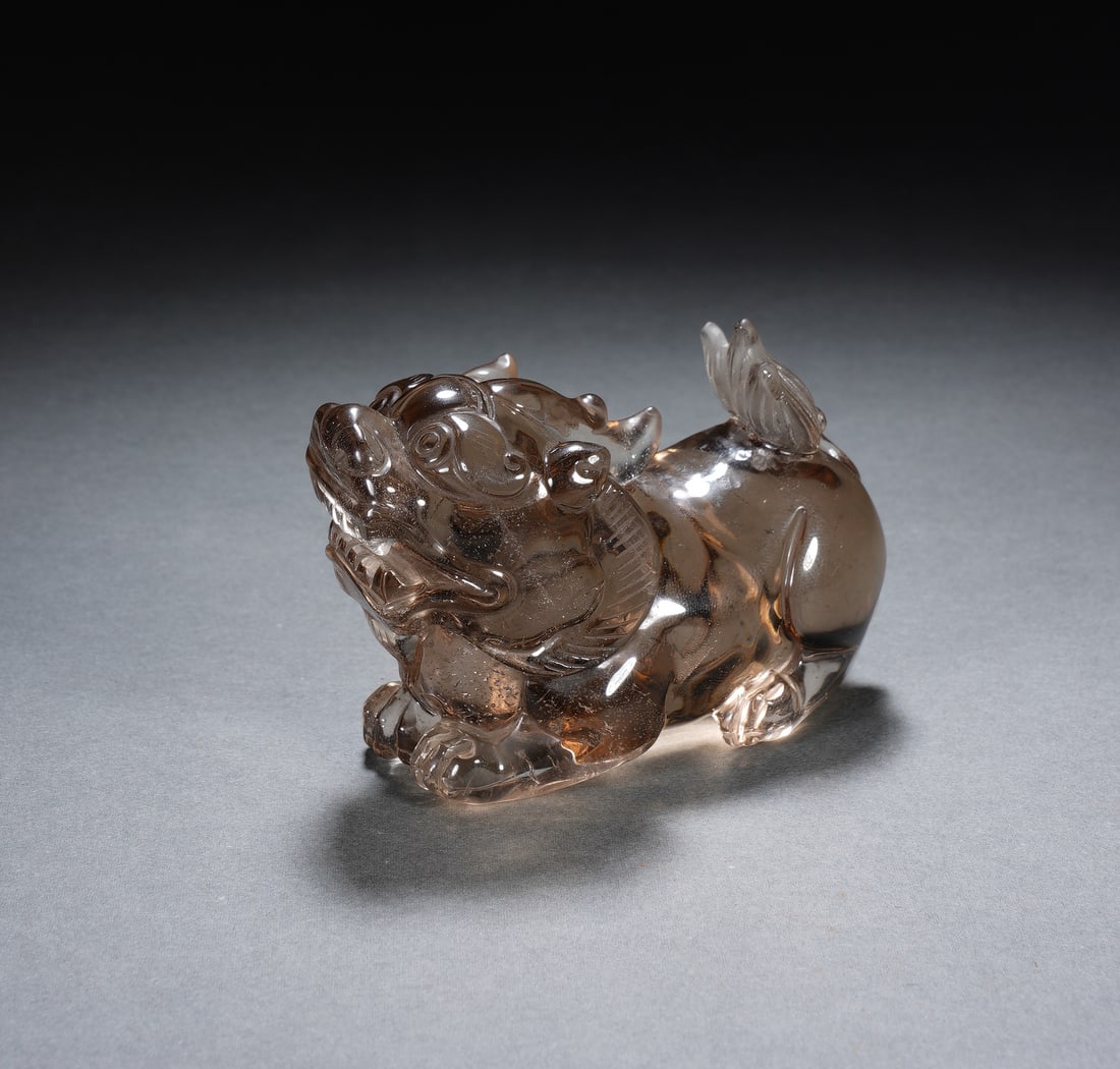 A CARVED SMOKY QUARTZ MYTHICAL BEAST BIXIU (1 of 7)