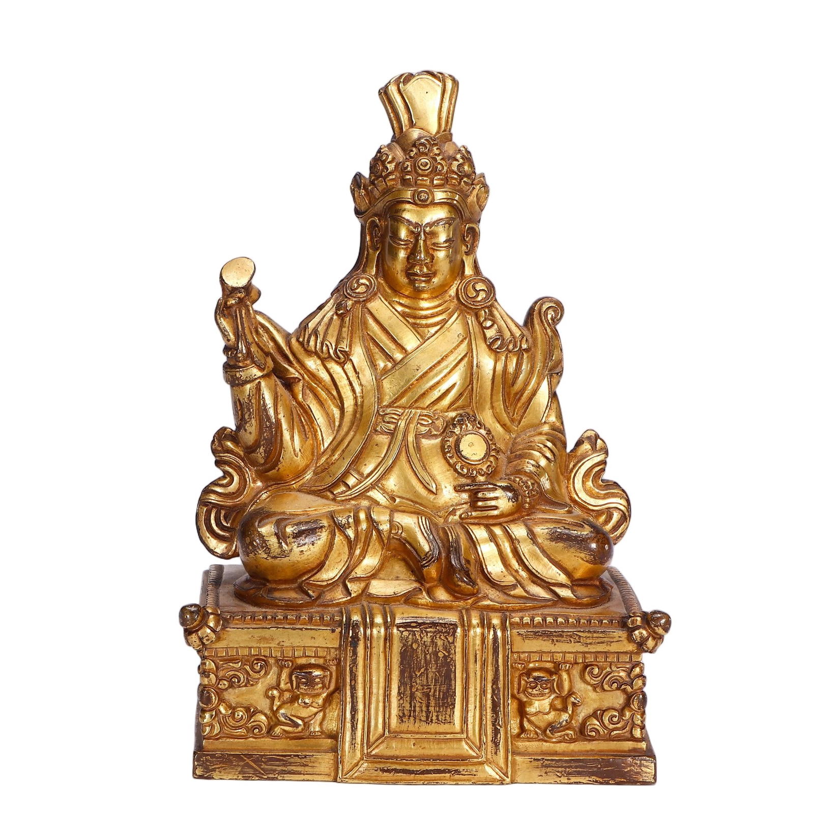 A BRONZE-GILT FIGURE OF PADMASAMBHAVA: A BRONZE-GILT FIGURE OF PADMASAMBHAVA Padmasambhava (literally ‘lotus-born’ in Sanskrit), also known as Guru Rinpoche among Tibetans, is believed to be one of the principal masters to bring Buddhi