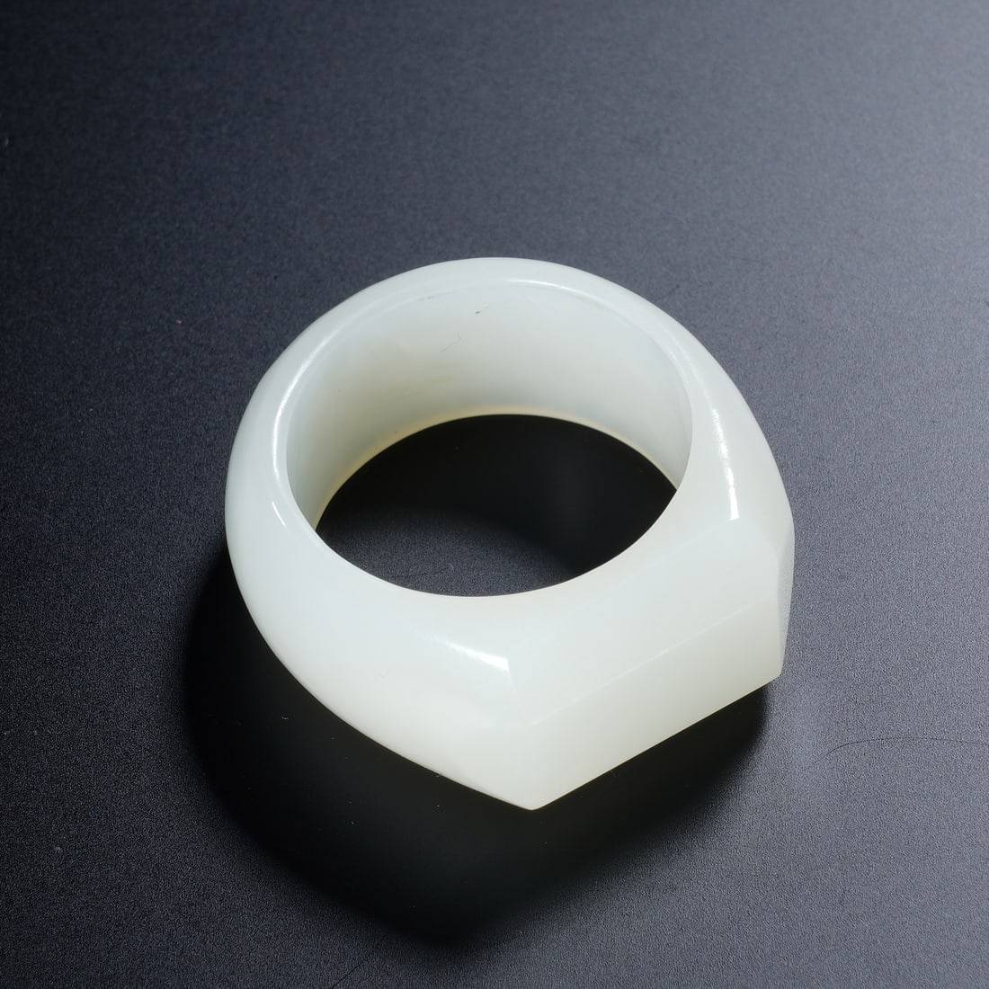 A WHITE JADE ARCHER RING (1 of 5)