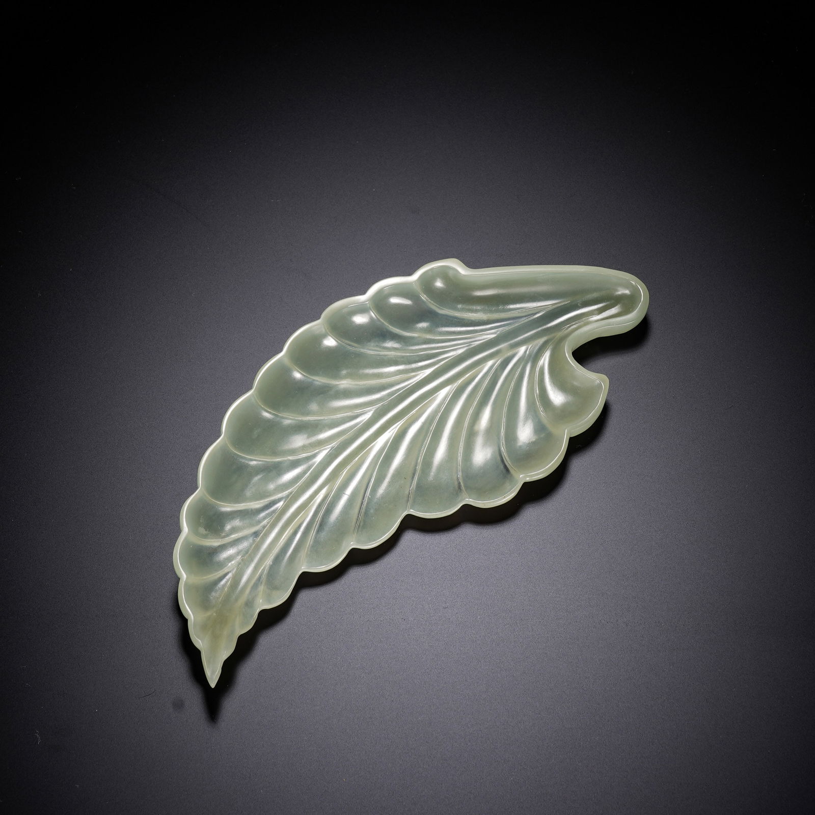 A CARVED JADE LEAF FORM STAND (1 of 6)
