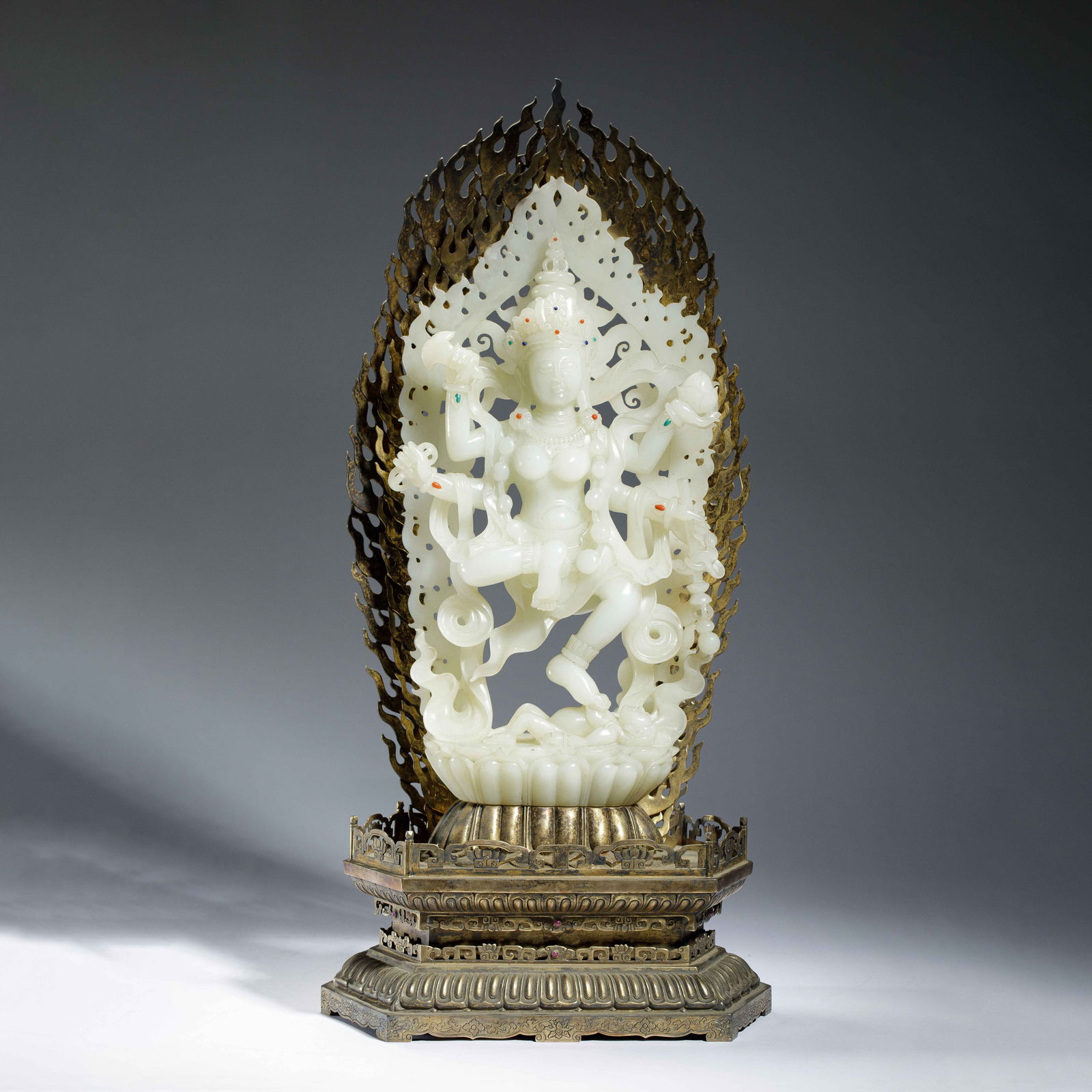 A FINE CARVED WHITE JADE DAKINI (1 of 10)