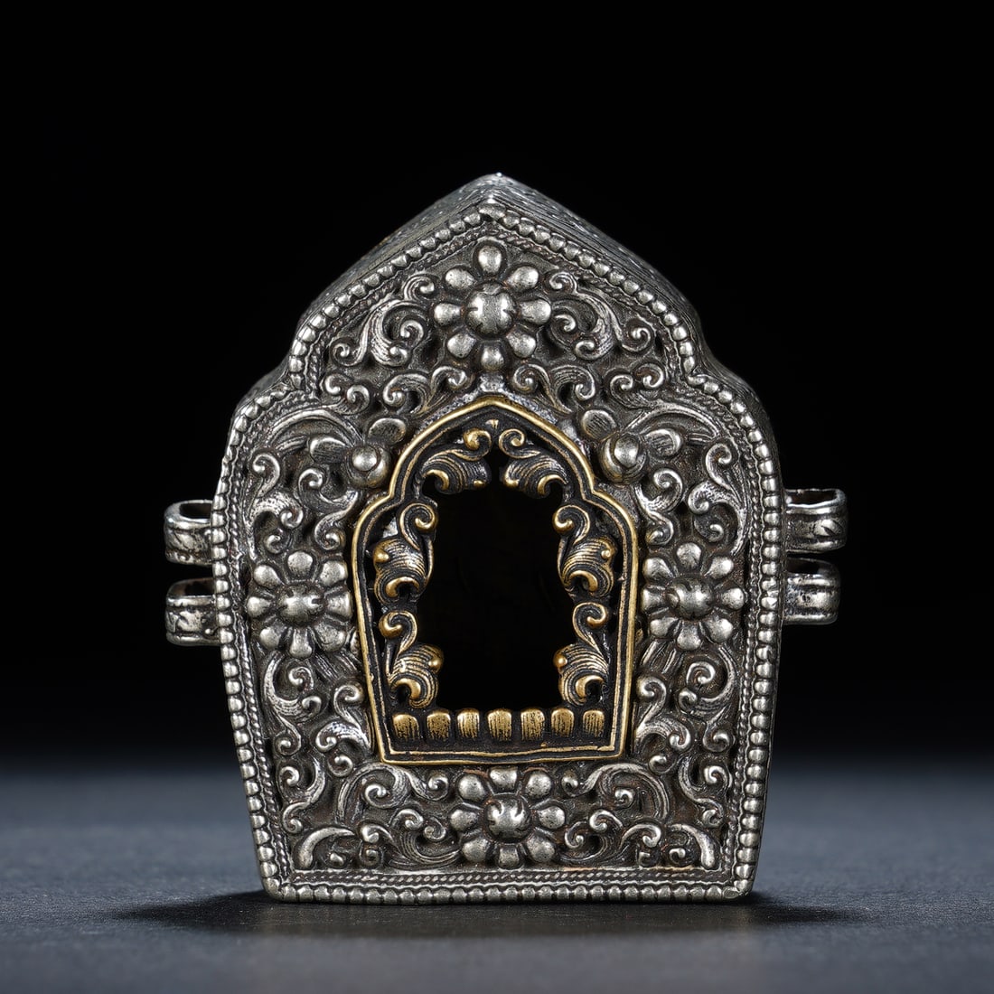 Chinese Silver Ghau Amulet Box: Chinese Silver Ghau Amulet Box This is a finely crafted Chinese silver ghau, or portable shrine, of traditional Tibetan Buddhist design. The exterior is richly adorned with repouss? floral and scrolli