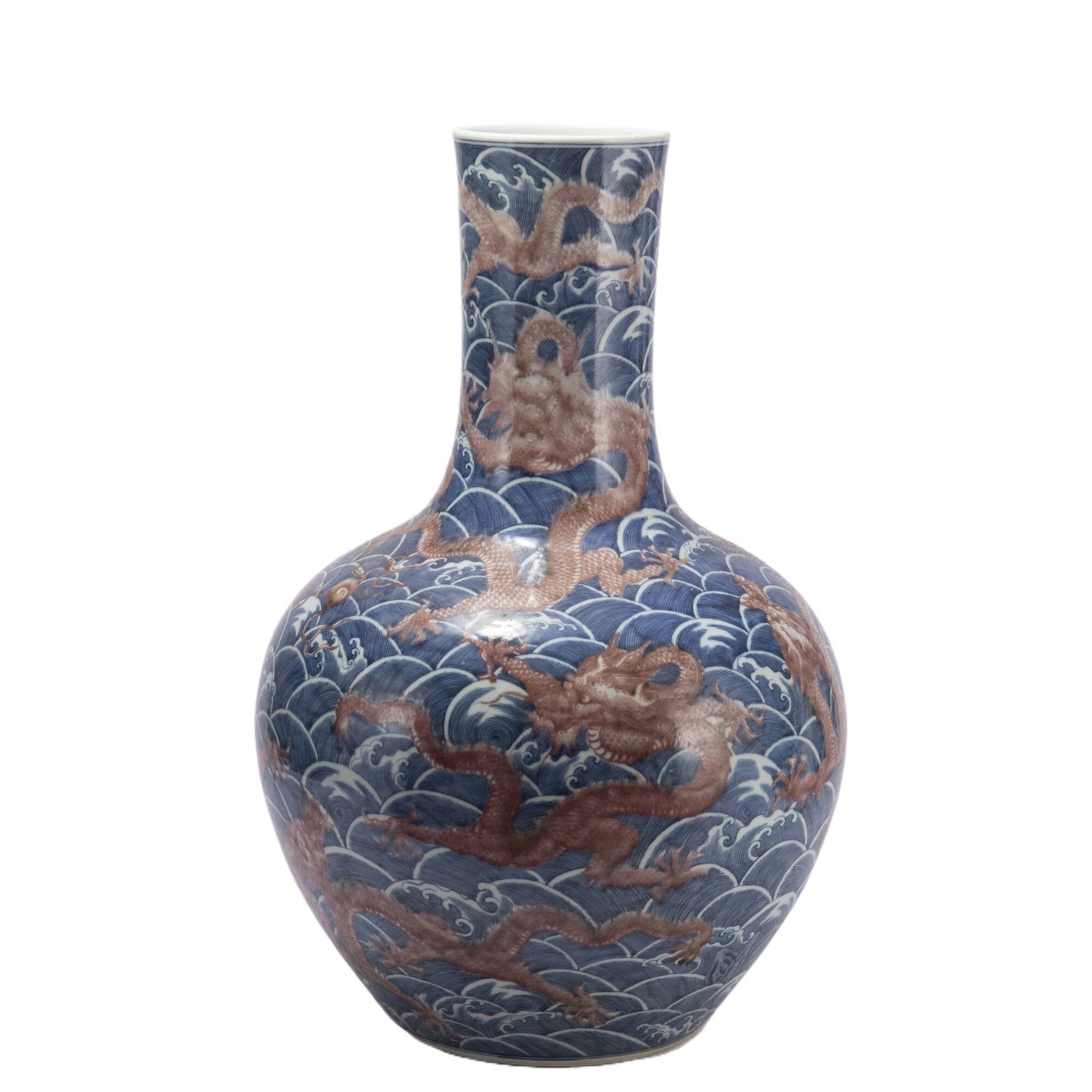 A CHINESE UNDERGLAZE BLUE AND COPPER RED DRAGON VASE (1 of 10)