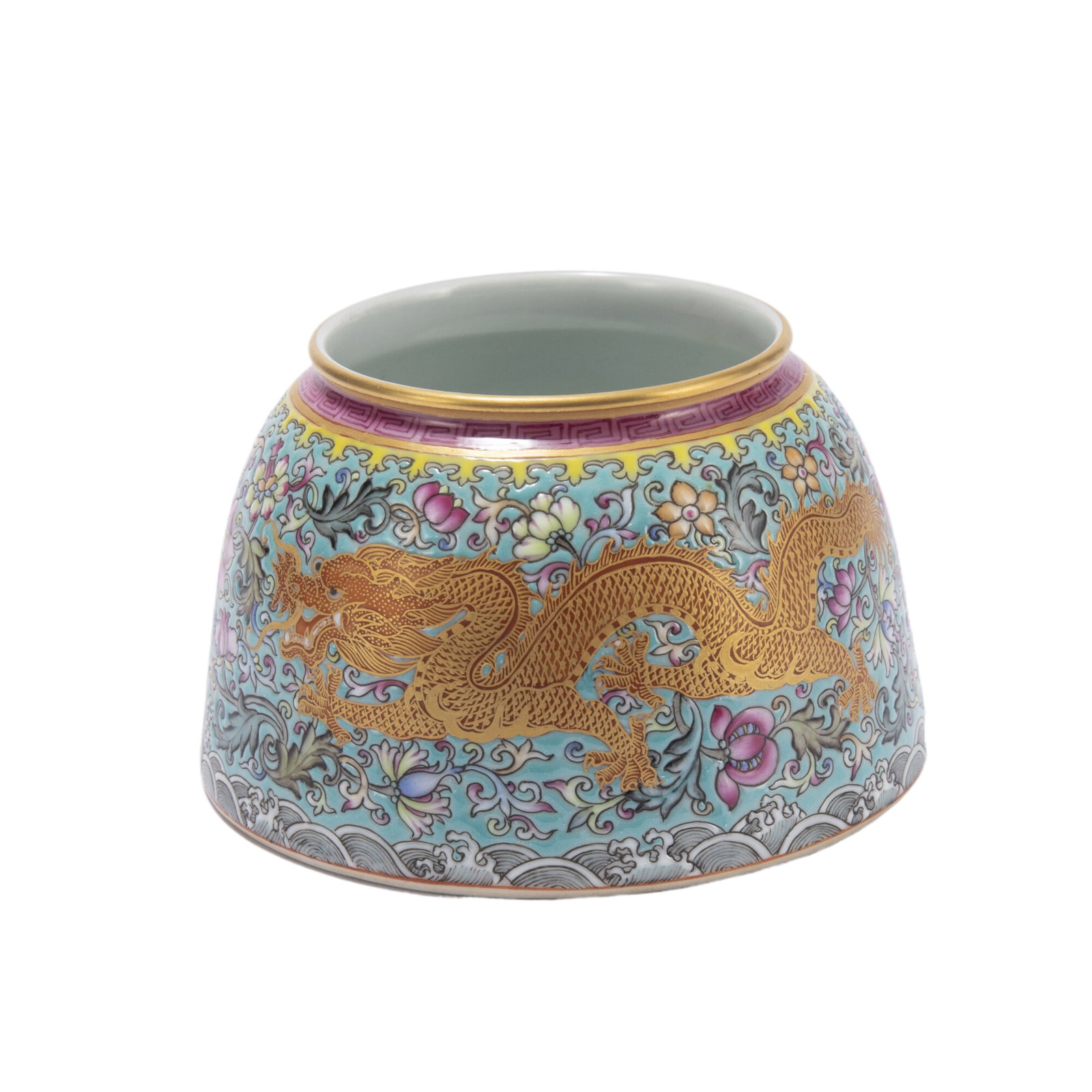 A FAMILLE ROSE FLOWERS PORCELAIN WATER POT: A FAMILLE ROSE FLOWERS PORCELAIN WATER POT Of dome shape with flared rim, decorated dragon and phoenix leaping in floral scrolls, above foaming waves. DIMENSIONS: Diam. 10 cm. H. 6.5 cm. Weight 200 gr