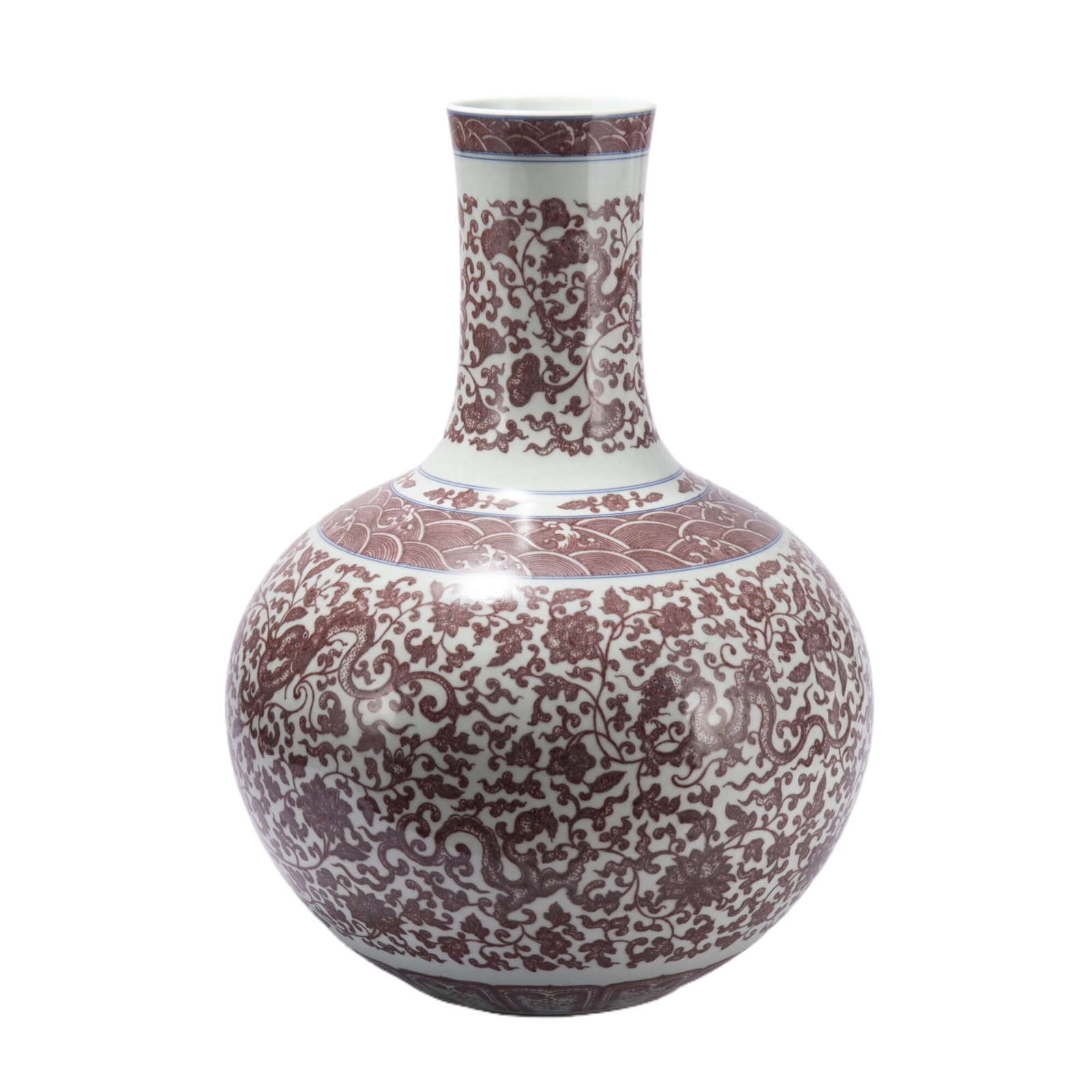 A RED UNDER GLAZE PORCELAIN DRAGON PHOENIX VASE,QING: A RED UNDER GLAZE PORCELAIN DRAGON PHOENIX VASE,QING Raising from a circular foot to a straight neck, the globular body painted with phoenix among floral scrolls in copper red. DIMENSIONS: Diam. 30 cm