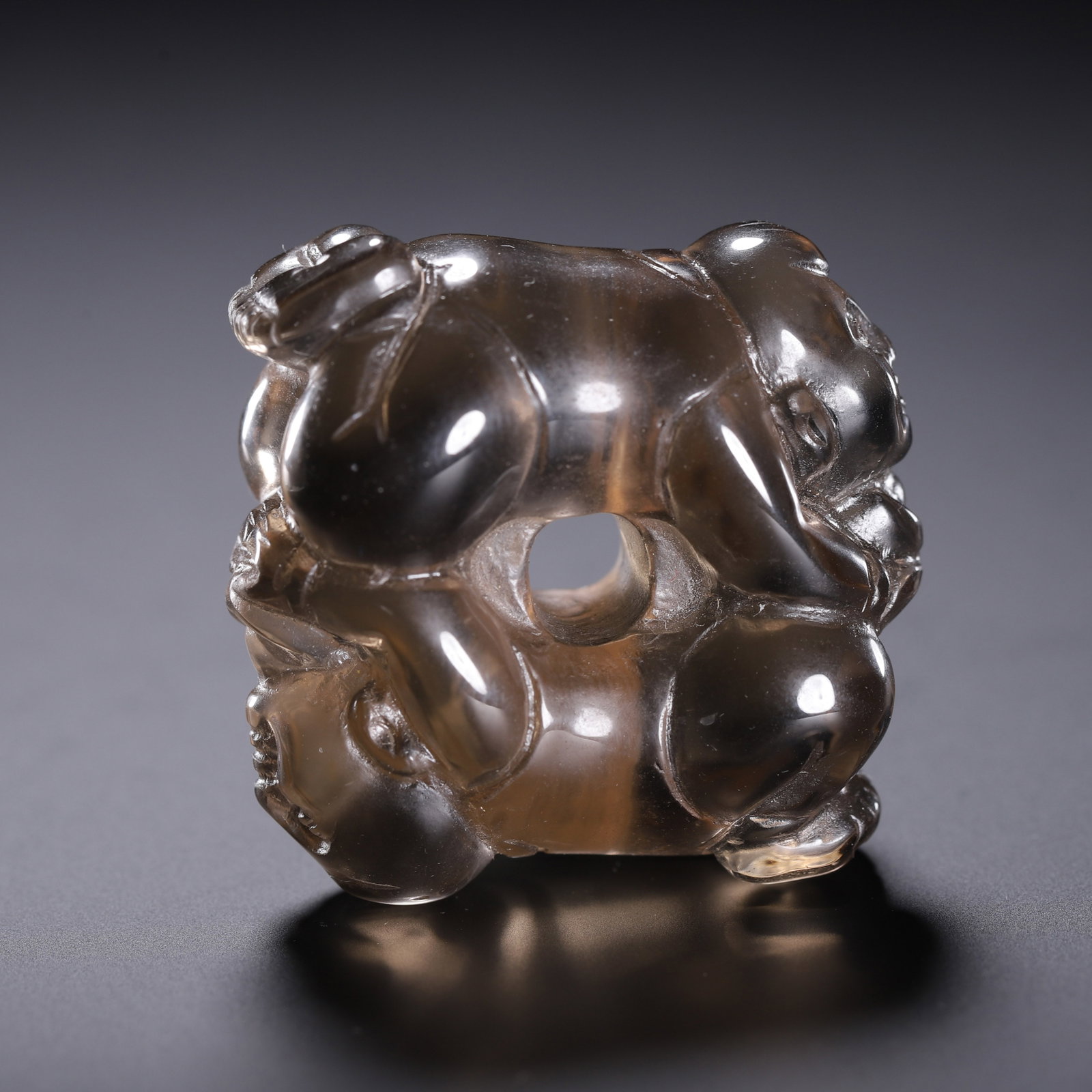 A Chinese Rock Crystal Double Boys Pendant: A Chinese Rock Crystal Double Boys Pendant This Chinese rock crystal pendant measures 3.6 cm in length and 3.2 cm in width. Carved from translucent smoky crystal, the piece features two playful boys