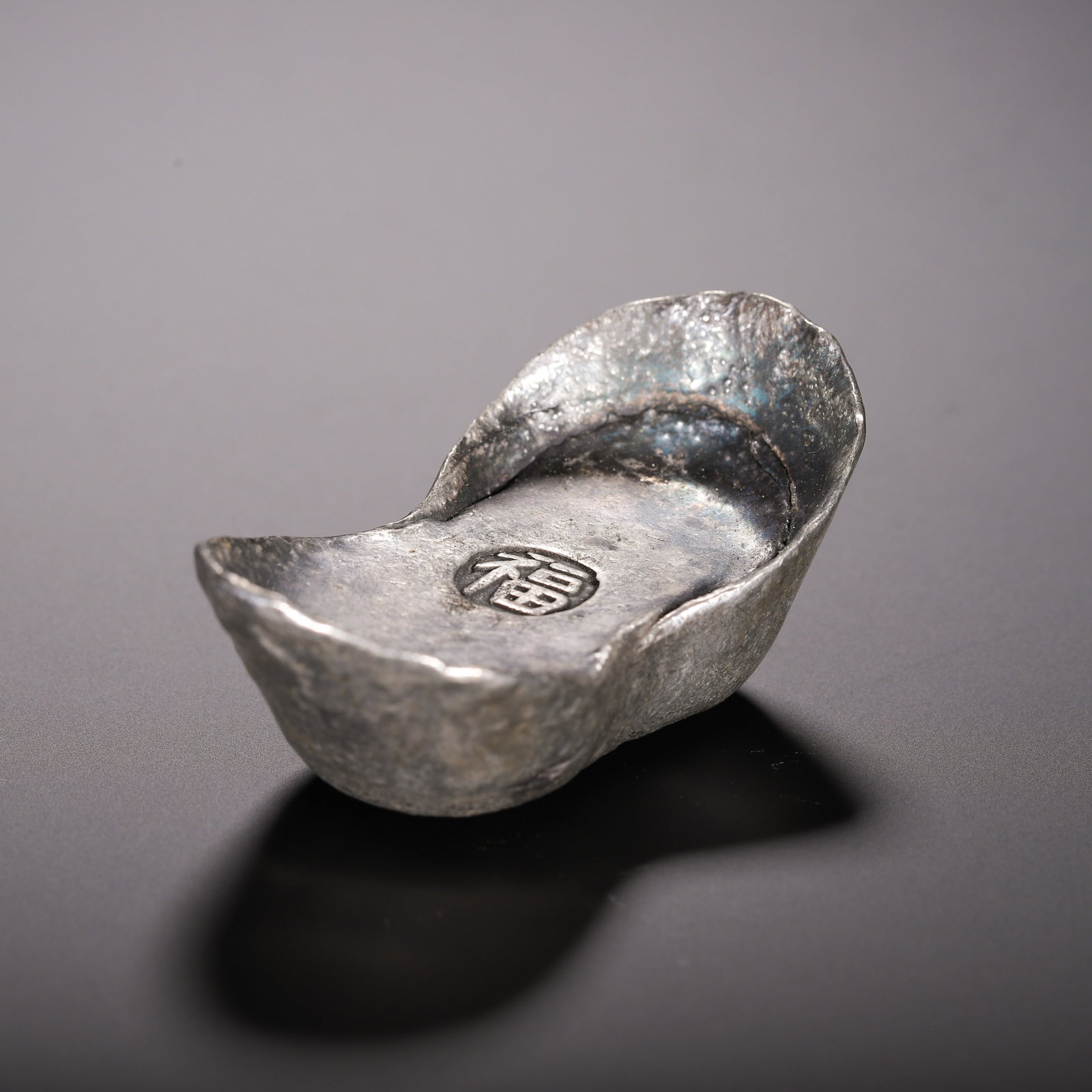 A Chinese Silver Sycee Ingot (1 of 10)