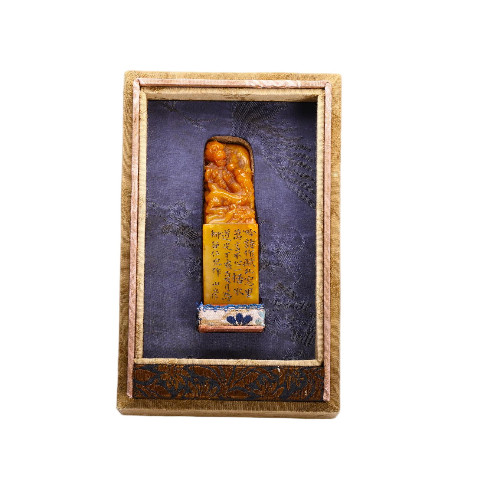 Chinese Tianhuang Stone Seal: Chinese Tianhuang Stone Seal This fine Tianhuang stone seal features a rich, warm golden-yellow hue with natural textural variations. The top is intricately carved with a mythical dragon motif, render