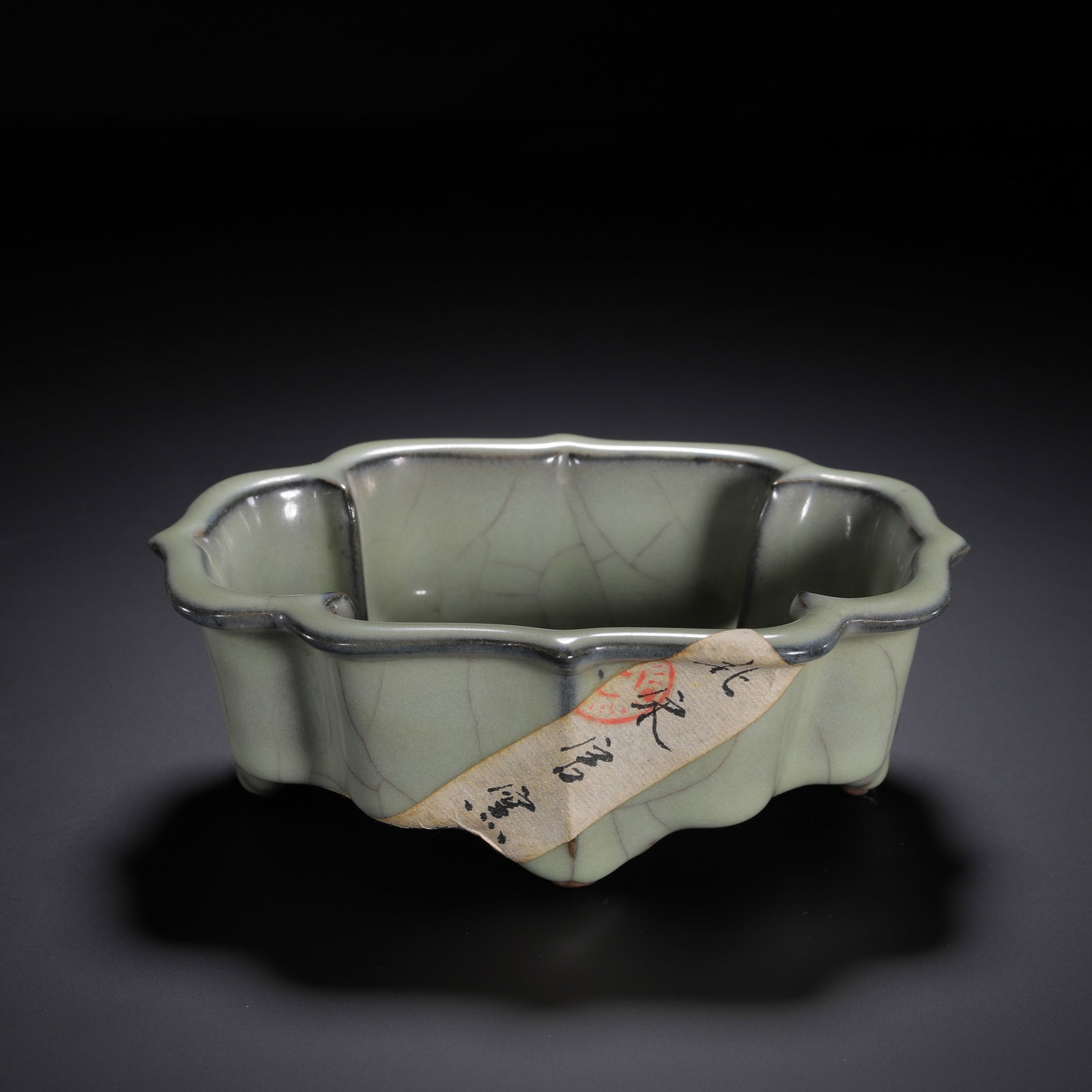 Chinese Guan-Type Crackle Glaze Flower-Form Brush Washer: Chinese Guan-Type Crackle Glaze Flower-Form Brush Washer A Chinese Guan-type porcelain brush washer, featuring a lobed, flower-shaped form supported by small feet, covered in a soft celadon glaze with