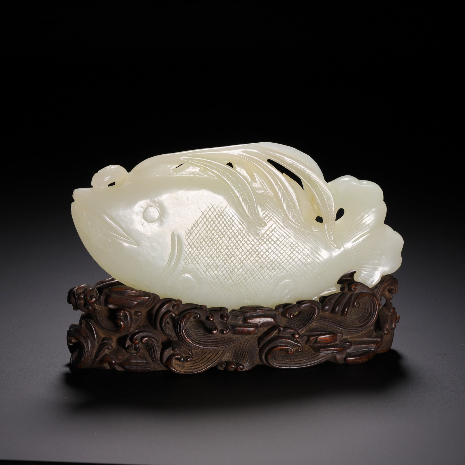 A Chinese Hetian Jade Carving of a Fish with Stand (1 of 9)