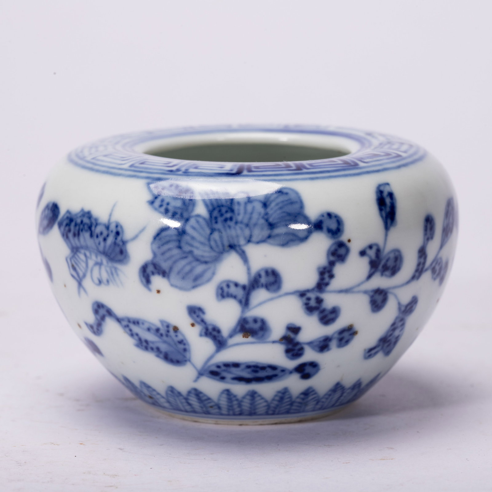 Chinese Blue and White Porcelain Water Pot: Chinese Blue and White Porcelain Water Pot A Chinese blue and white porcelain water pot of rounded, globular form with a wide, low opening. The exterior is painted in varying shades of cobalt blue wit