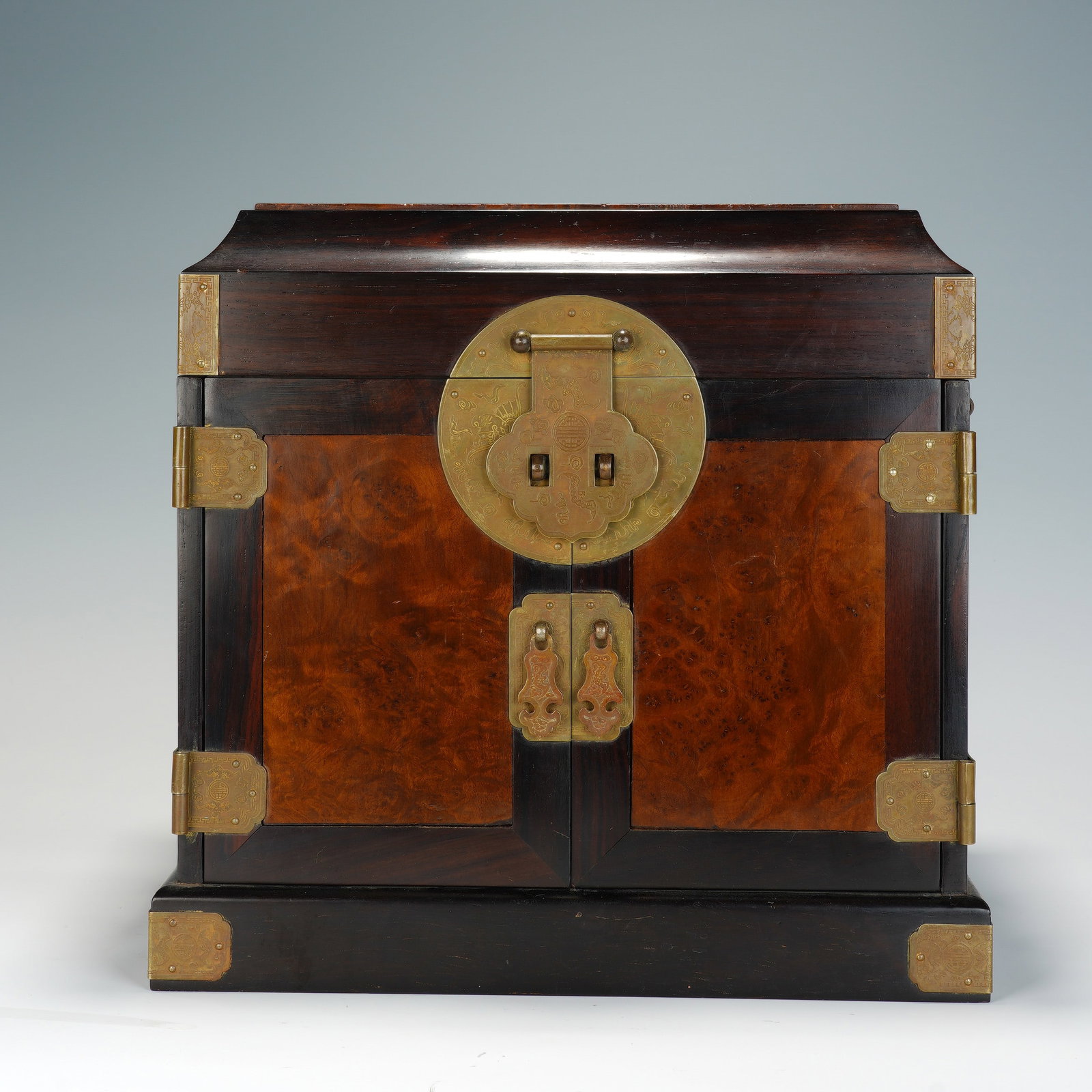 A CHINESE ZITAN CABINET WITH HUANGHUALI BURL INLAY (1 of 10)