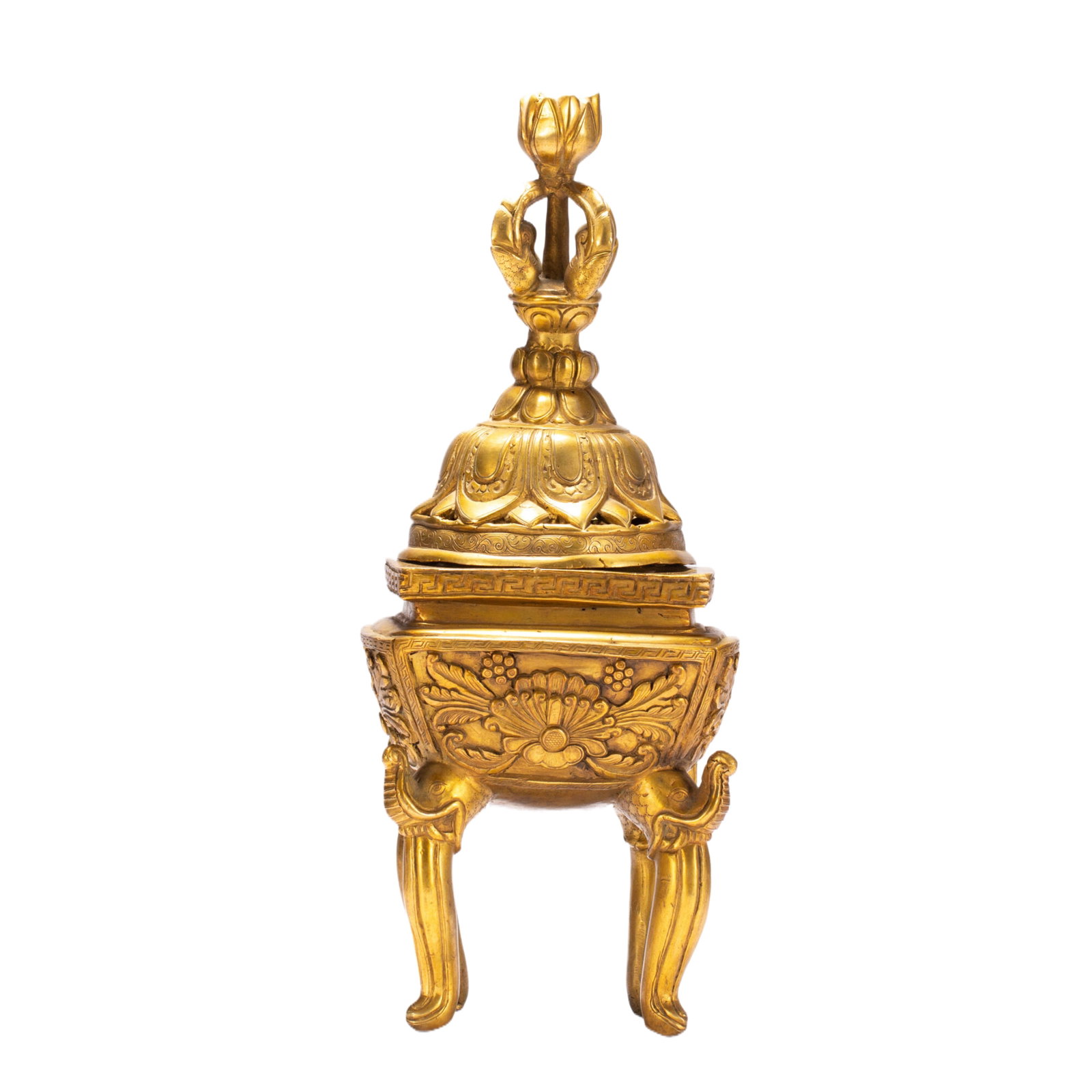 A CHINESE TIBETAN GILT BRONZE CENSER: A CHINESE TIBETAN GILT BRONZE CENSER This Tibetan-style incense burner is cast in bronze and fully gilded, standing upon three elegantly shaped elephant-head legs. Its square vessel body is richly emb