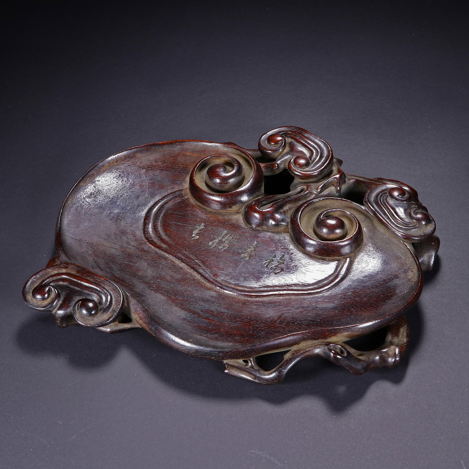 A CHINESE HUANGHUALI RUYI FORM INK PALETTE (1 of 9)