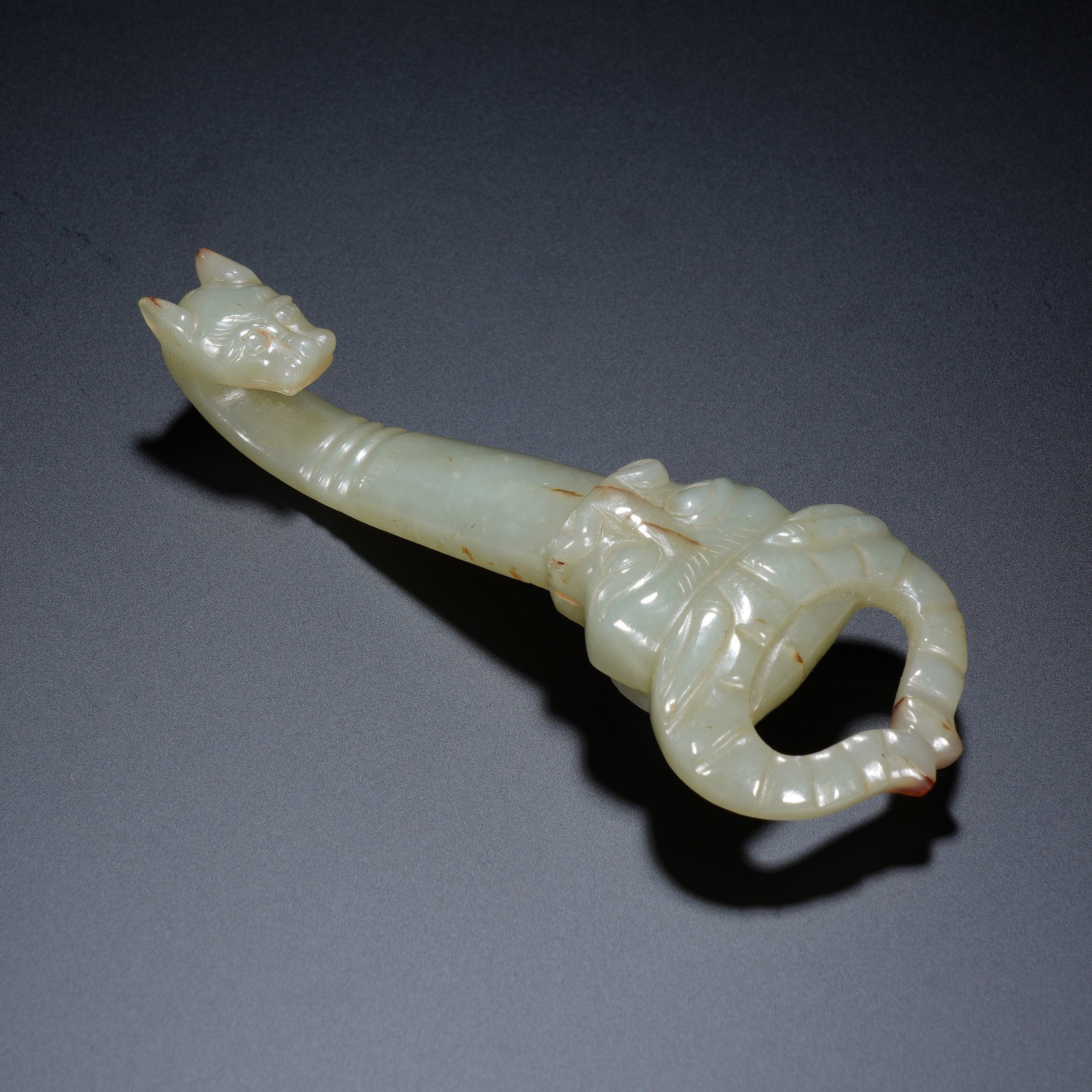 A CHINESE ARCHAIC JADE BELT HOOK (1 of 10)