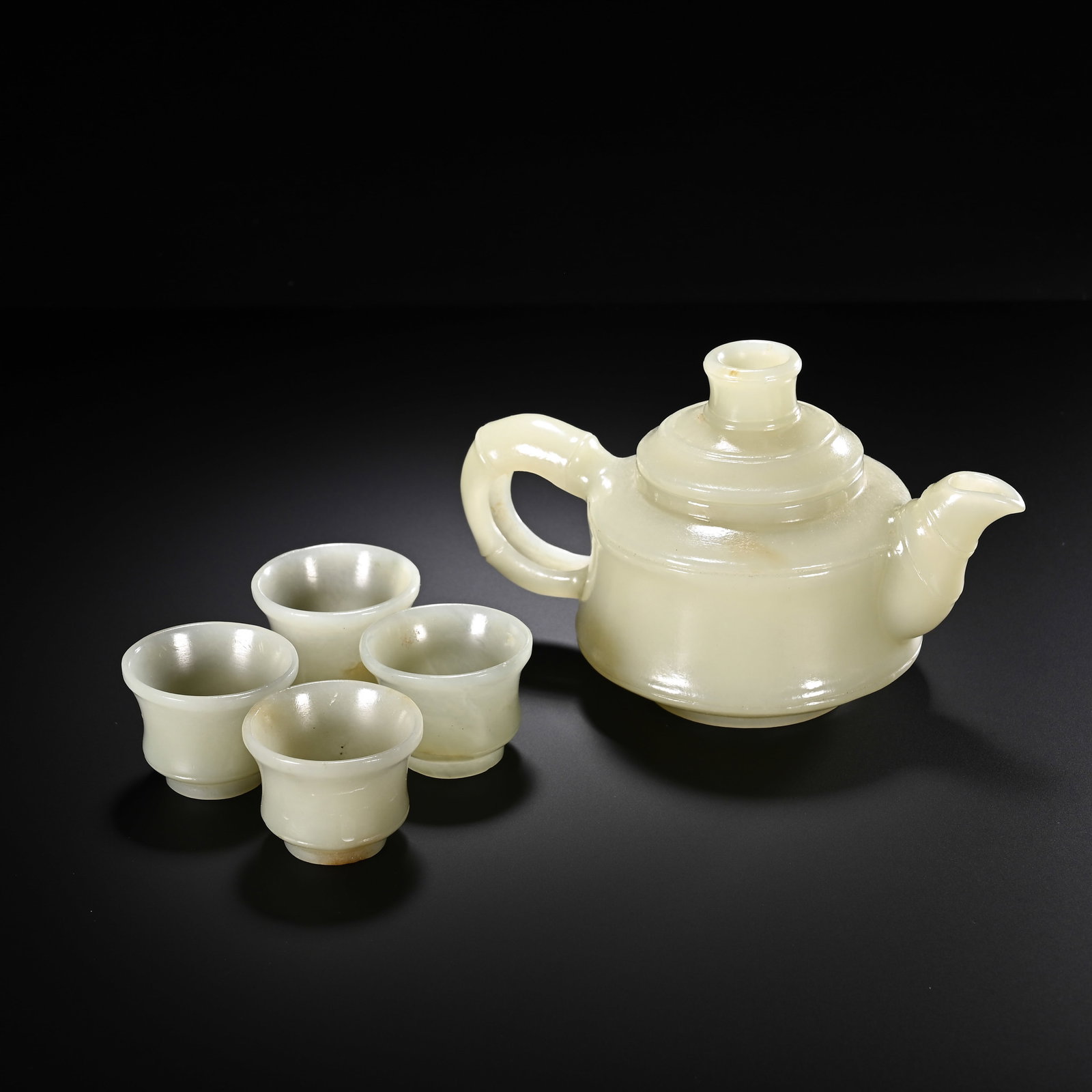 A CHINESE WHITE NEPHRITE TEAPOT SET WITH FOUR CUPS (1 of 9)