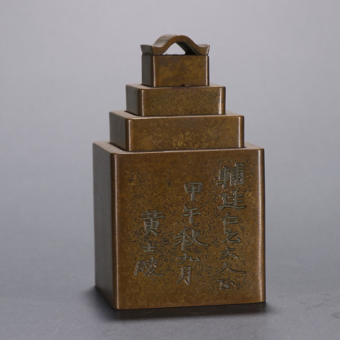 A CHINESE BRONZE NESTED SEAL SET (1 of 9)
