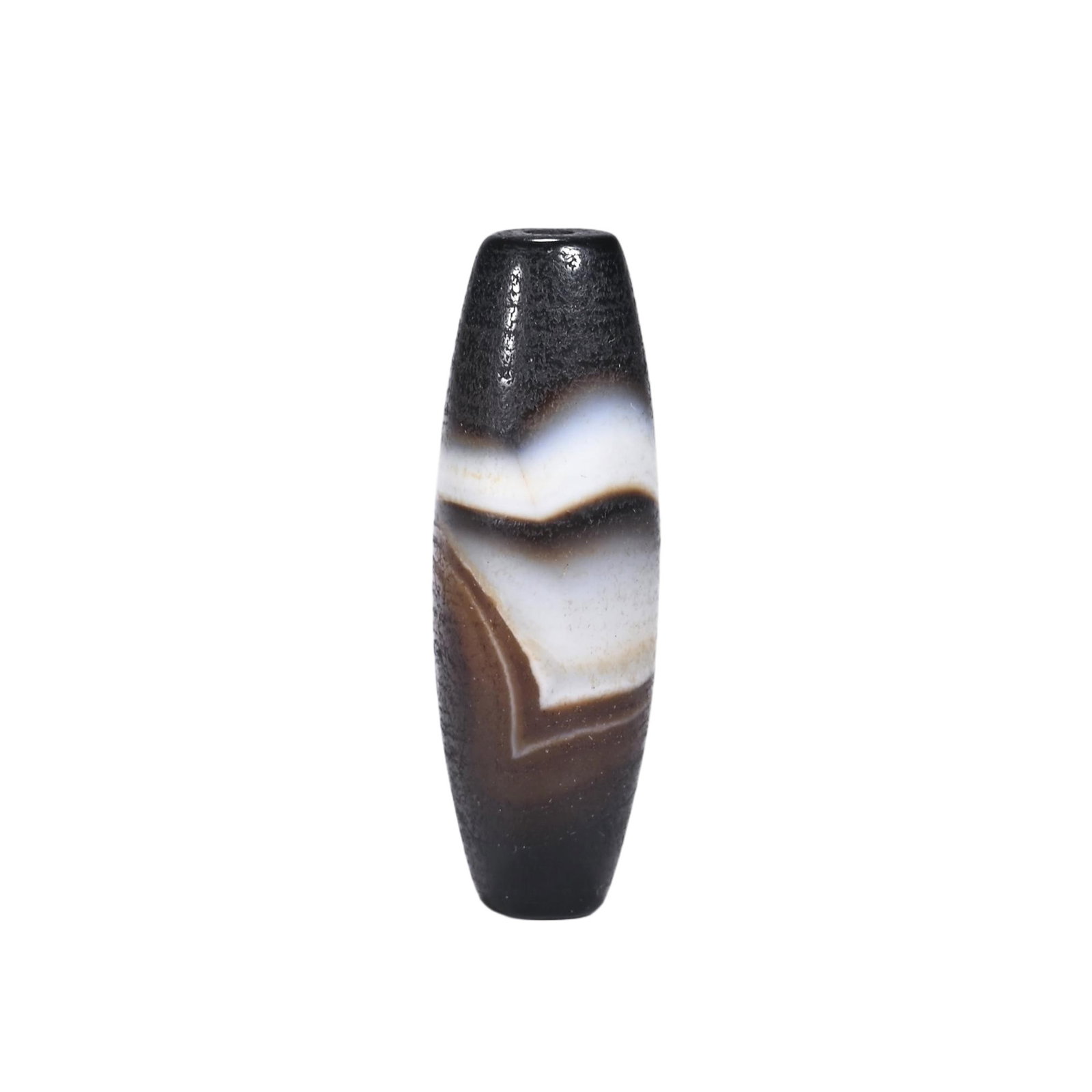A CHINESE BANDED AGATE DZI BEAD: A CHINESE BANDED AGATE DZI BEAD This tapered cylindrical dzi bead is polished from natural banded agate, featuring striking layered striations of deep black, warm sepia brown and milky white forming a