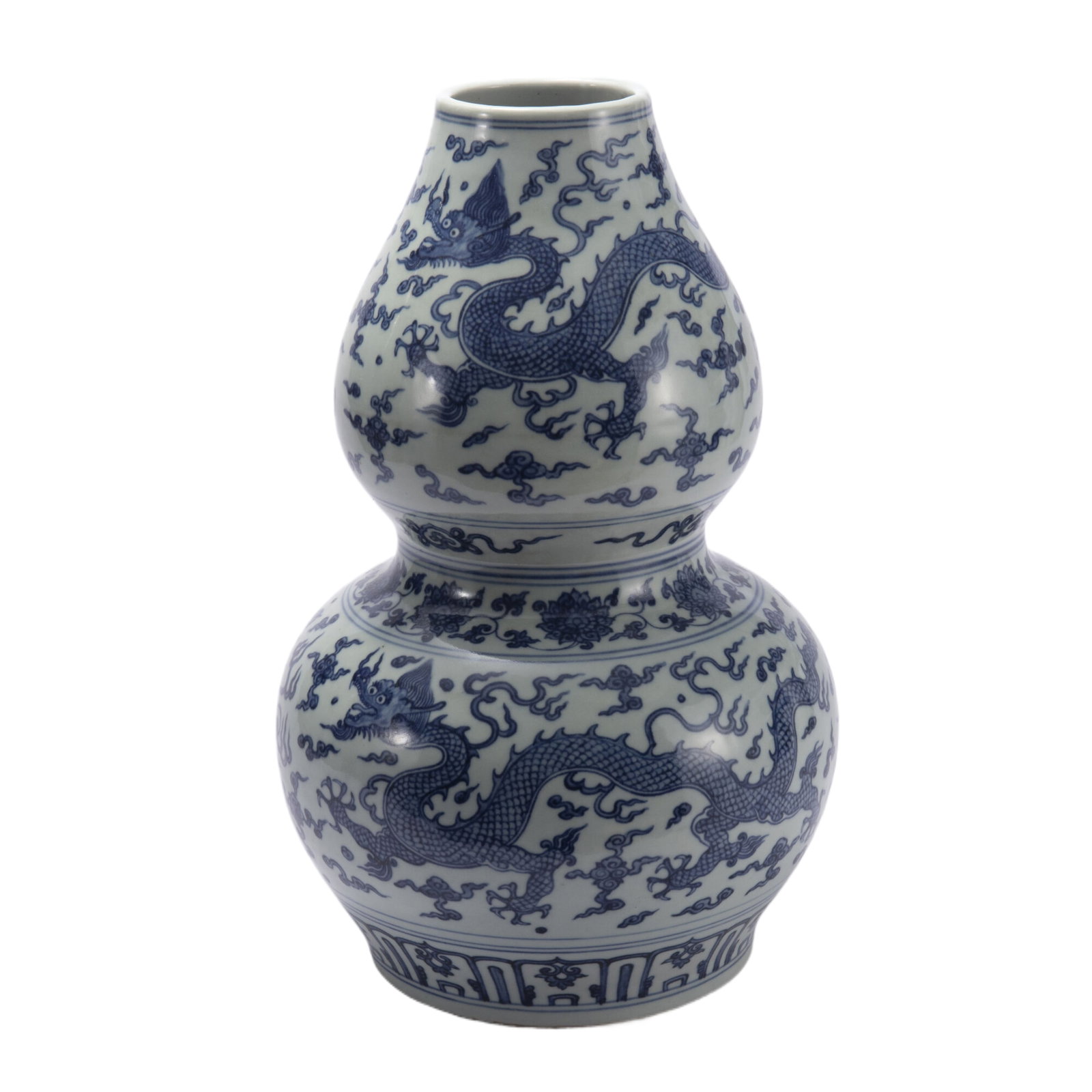 A CHINESE BLUE AND WHITE PORCELAIN DOUBLE-GOURD VASE: A CHINESE BLUE AND WHITE PORCELAIN DOUBLE-GOURD VASE Comprising upper and lower bulbs, painted walking dragons chasing flaming pearl among swirling clouds. DIMENSIONS: Diam. 23 cm. H. 42 cm. HAVE A SI
