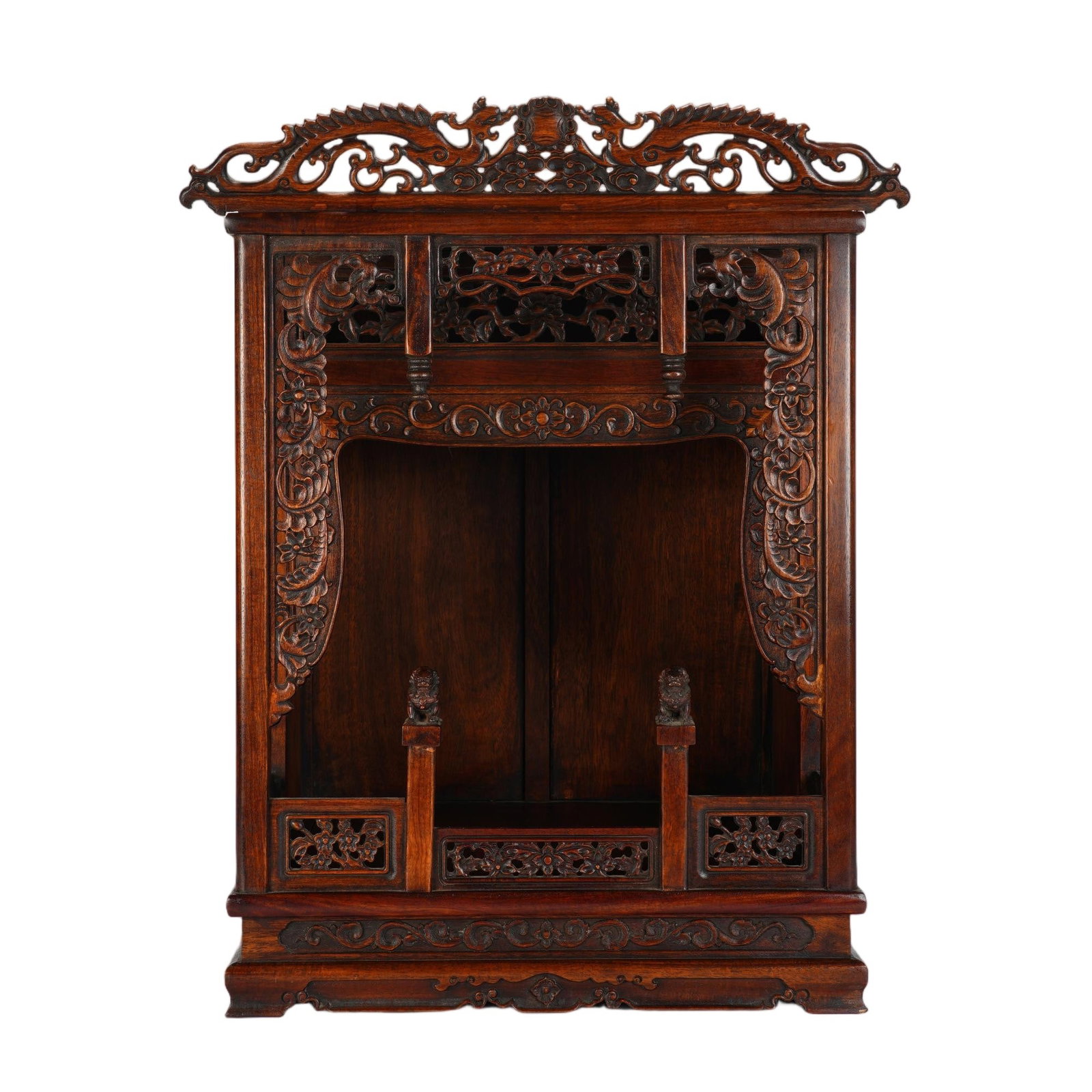 A CHINESE HUANGHUALI WOOD BUDDHA SHRINE: A CHINESE HUANGHUALI WOOD BUDDHA SHRINE This finely carved huanghuali wood niche shrine measures 42 cm wide, 35 cm deep and 60 cm tall. Crafted from warm-toned huanghuali timber with natural polished 