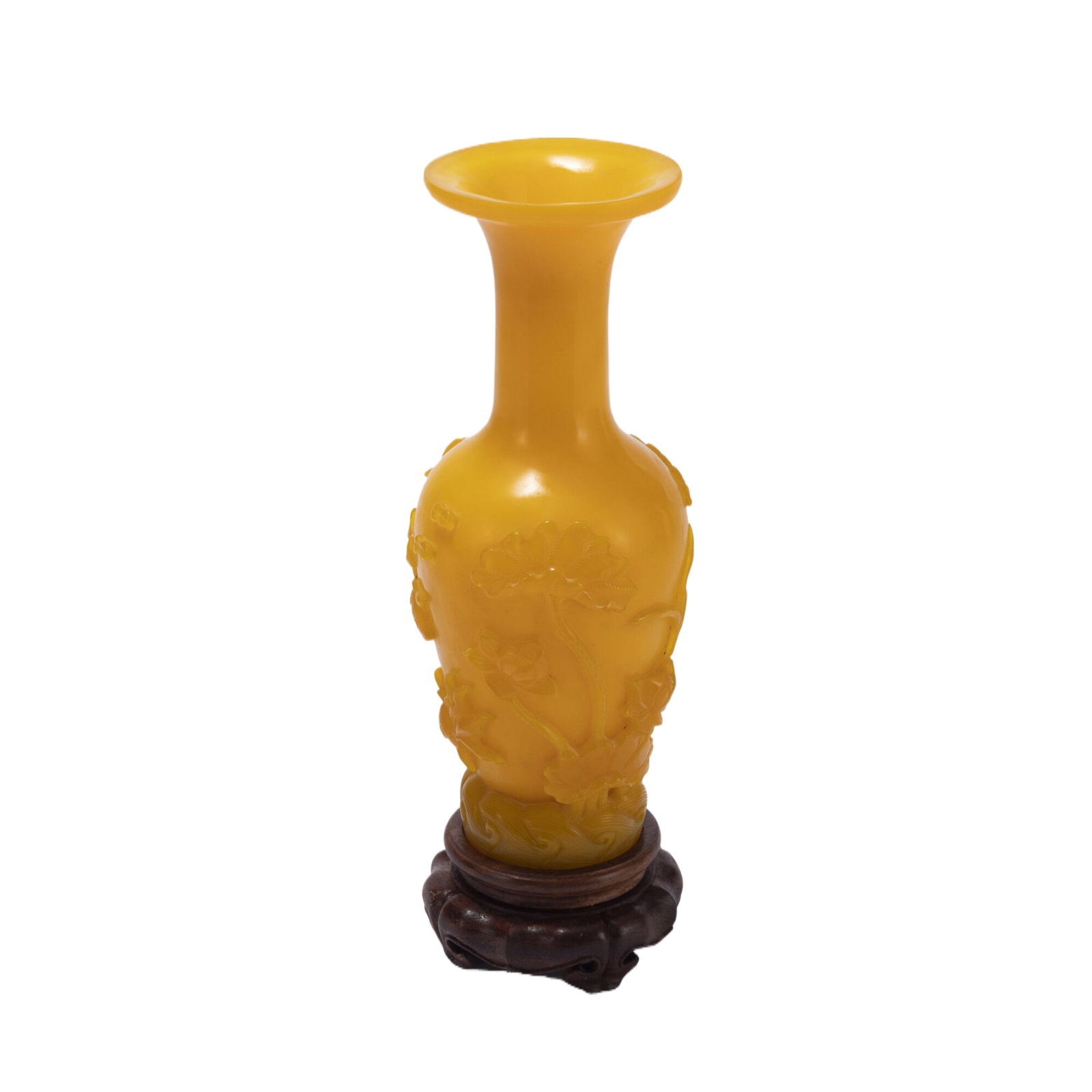 A YELLOW PEKING GLASS VASE: A YELLOW PEKING GLASS VASE Rising to a high shoulder and slender neck, carved with lotus sprays, overall in an opaque rich amber tone. DIMENSIONS: L. 9 cm. H. 25.5 cm. HAVE A SIMILAR ITEM TO SELL? CON