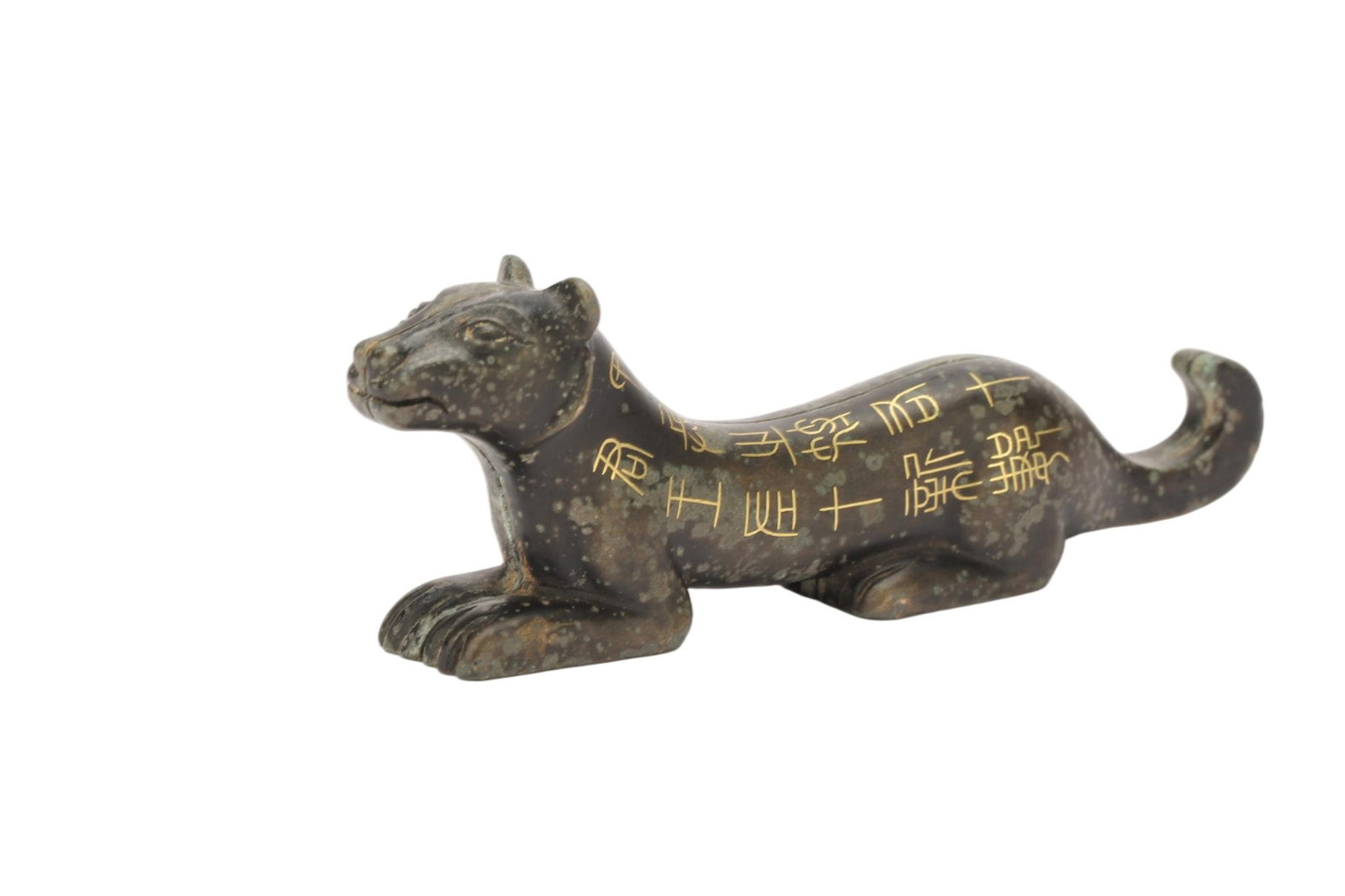A CHINESE BRONZE GOLD-INLAID TIGER TALLY: A CHINESE BRONZE GOLD-INLAID TIGER TALLY This bronze tally is sculpted in the form of a crouched tiger with streamlined musculature, defined facial features and curled upward tail, embodying ancient C