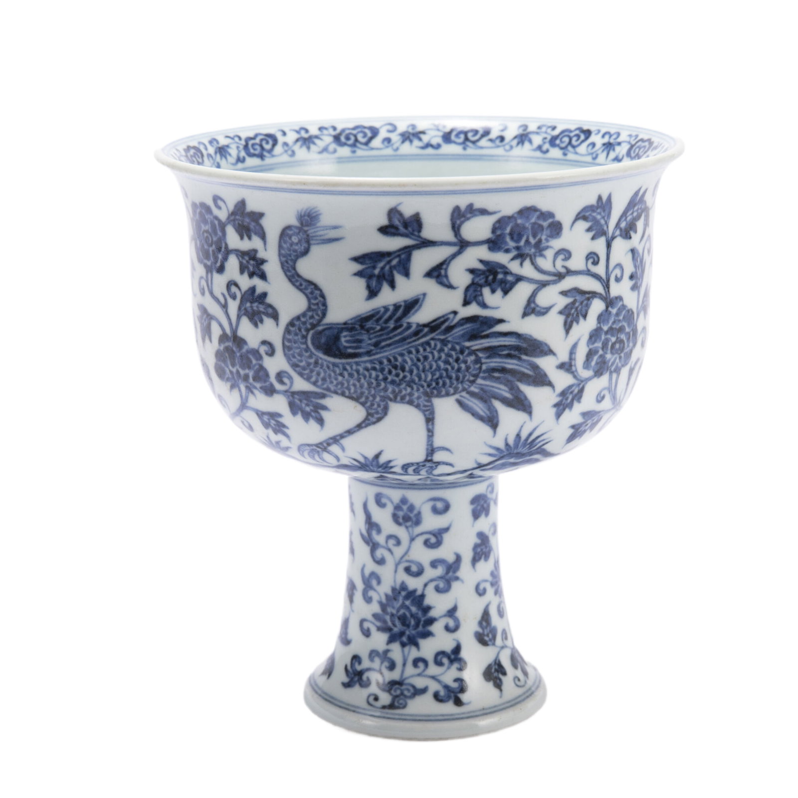 A BLUE AND WHITE PORCELAIN STEM-CUP: A BLUE AND WHITE PORCELAIN STEM-CUP The upright sides painted in a vibrant underglaze blue with phoenix among peony scrolls. DIMENSIONS: L. 15.7 cm. H. 17.9 cm. HAVE A SIMILAR ITEM TO SELL? CONTACT: I