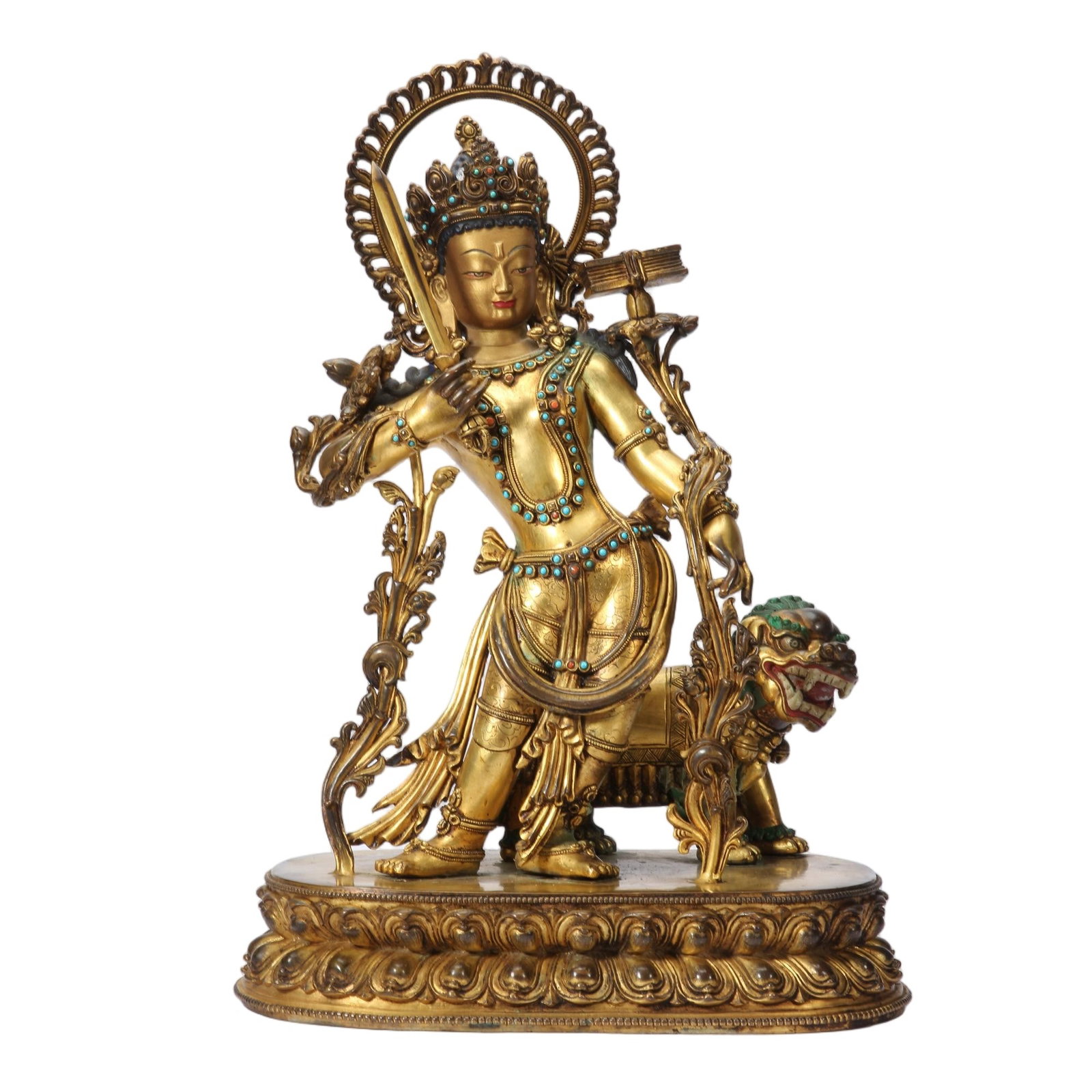 A CHINESE GILT BRONZE MANJUSHRI BUDDHA STATUE: A CHINESE GILT BRONZE MANJUSHRI BUDDHA STATUE This large fully gilded copper sculpture depicts standing Manjushri, the Bodhisattva of wisdom, accompanied by his symbolic lion mount at his side. The de