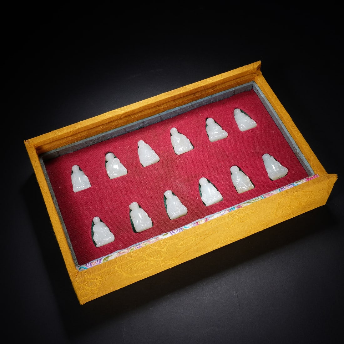 A COMPLETE SET OF CHINESE WHITE JADE ZODIAC FIGURES: A COMPLETE SET OF CHINESE WHITE JADE ZODIAC FIGURES This full suite of twelve miniature white nephrite zodiac statuettes each measures 1.7 cm wide, 1.1 cm deep and 2.7 cm tall, with a total weight of 