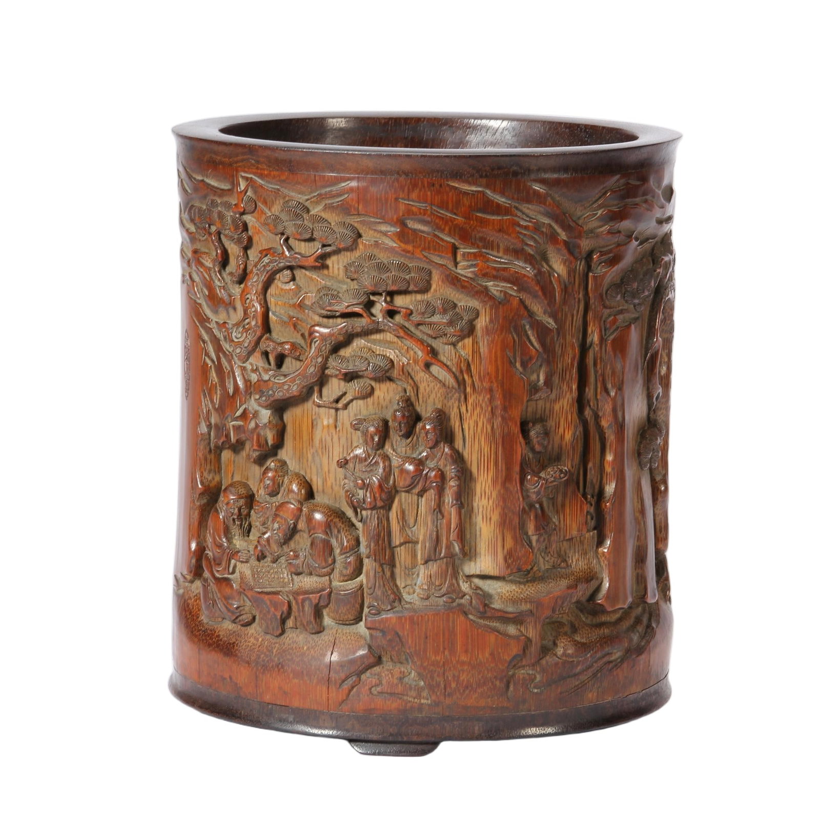 A CHINESE DEEP RELIEF CARVED BAMBOO FIGURE BRUSH POT: A CHINESE DEEP RELIEF CARVED BAMBOO FIGURE BRUSH POT This cylindrical bamboo brush pot boasts rich warm aged patina and subtle natural bamboo grain across its surface. The exterior is fully decorated 