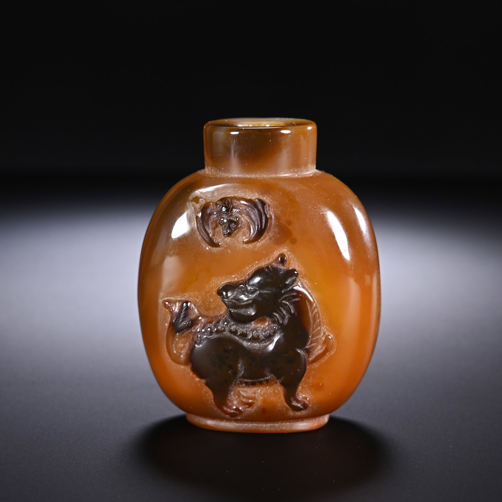 A CHINESE CAMEO AGATE SNUFF BOTTLE WITH QILIN AND BAT (1 of 6)