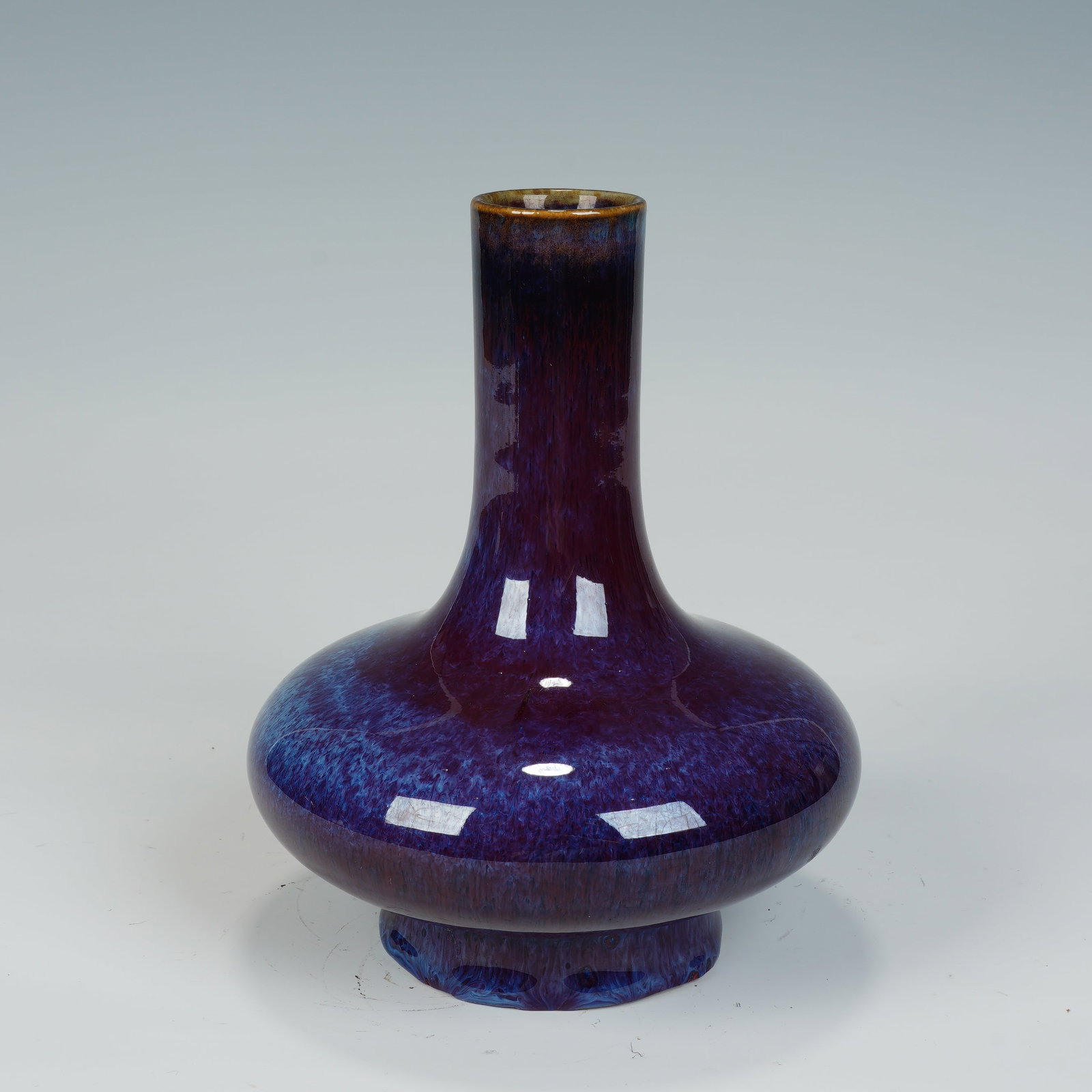 A CHINESE FLAMBE GLAZE SQUAT BOTTLE VASE (1 of 7)